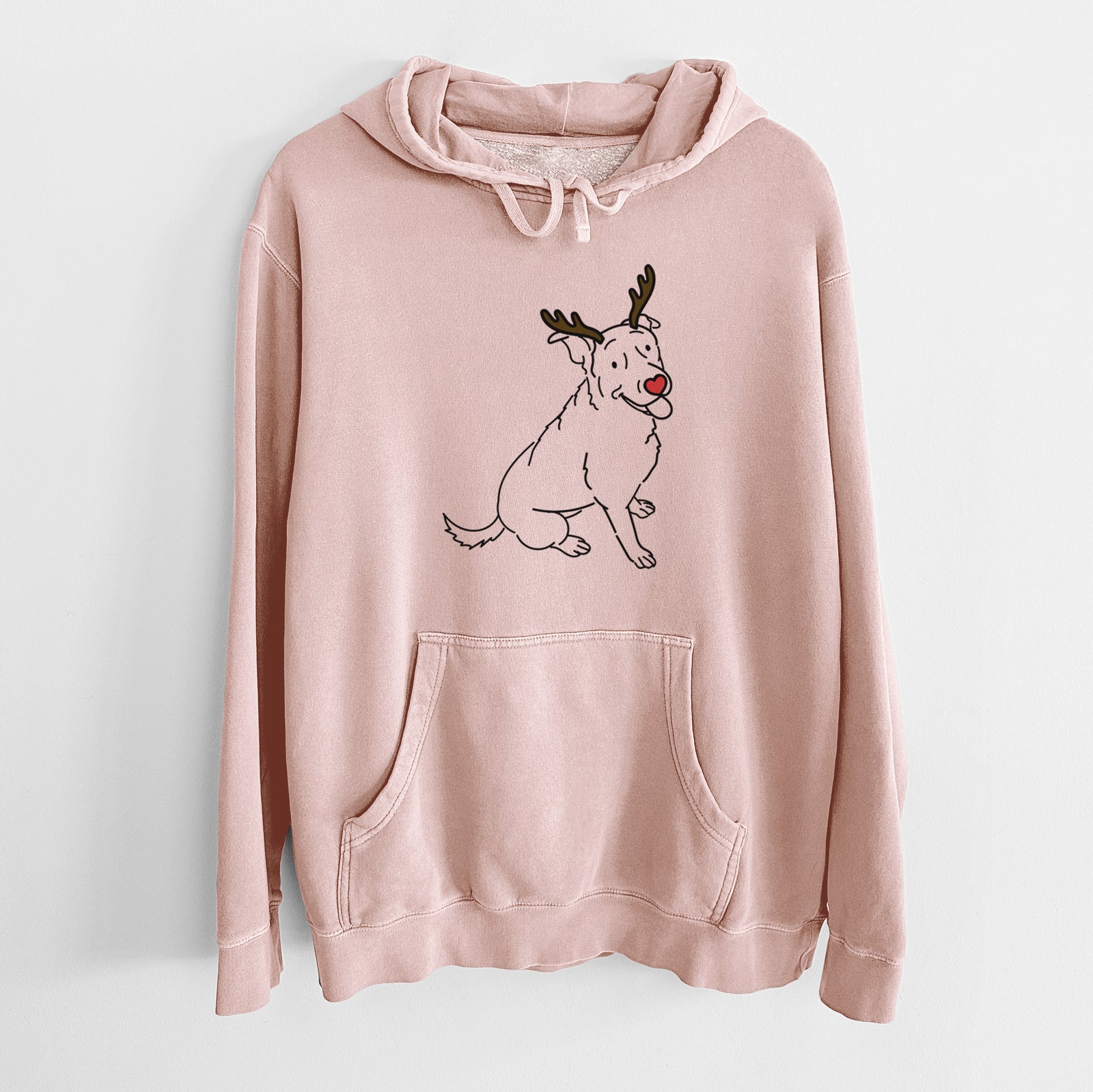 Minimalist line drawing of Rocky the Rottweiler Mix with reindeer antlers and a red nose on a Dusty Pink Unisex pigment dyed hoodie