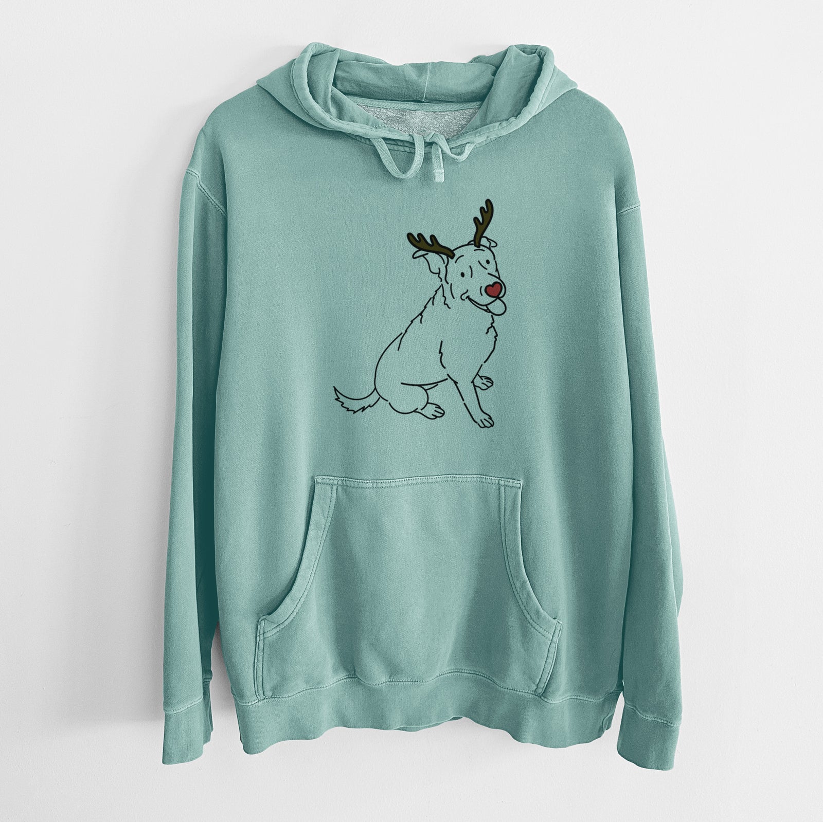Minimalist line drawing of Rocky the Rottweiler Mix with reindeer antlers and a red nose on a Mint Unisex pigment dyed hoodie