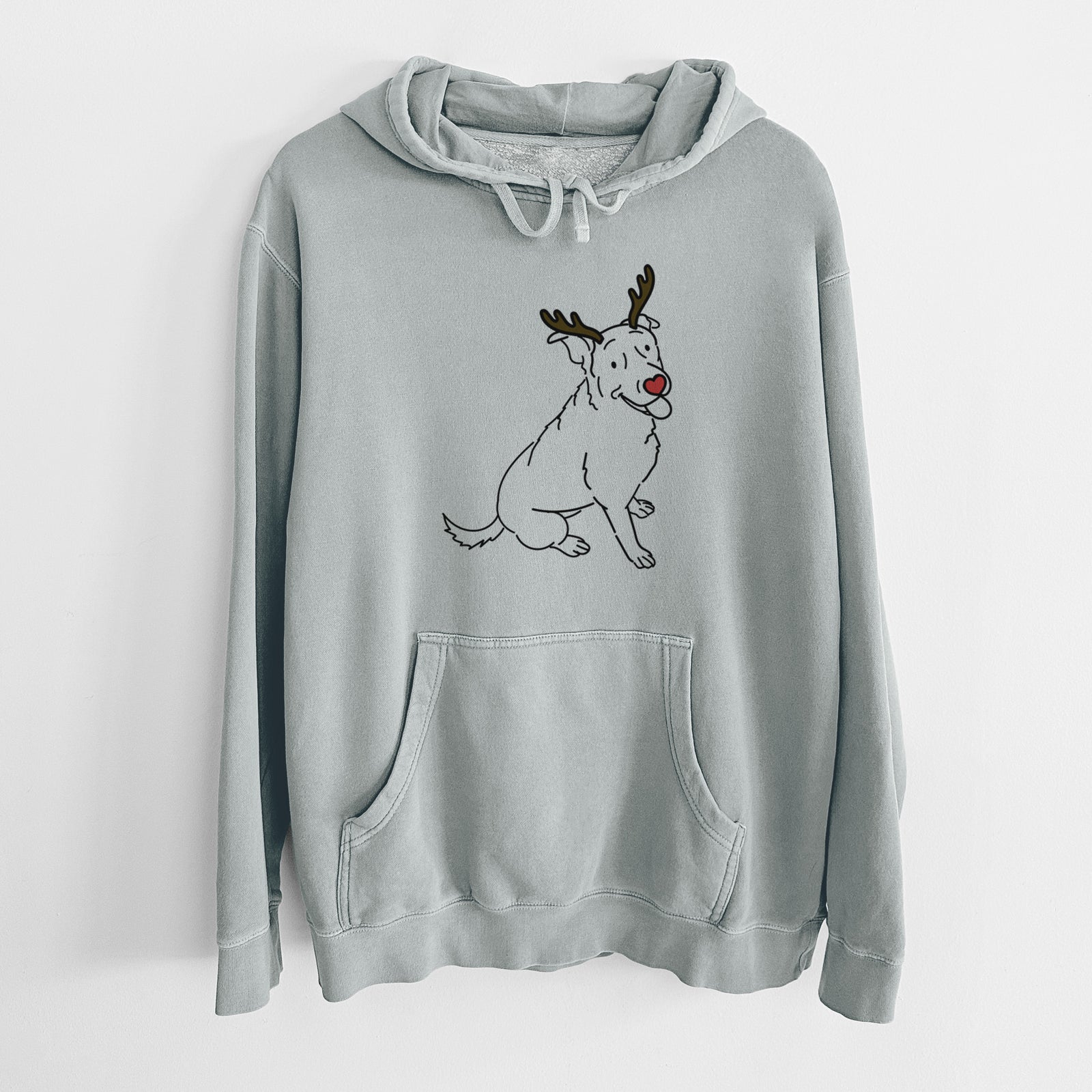 Minimalist line drawing of Rocky the Rottweiler Mix with reindeer antlers and a red nose on a Sage Unisex pigment dyed hoodie