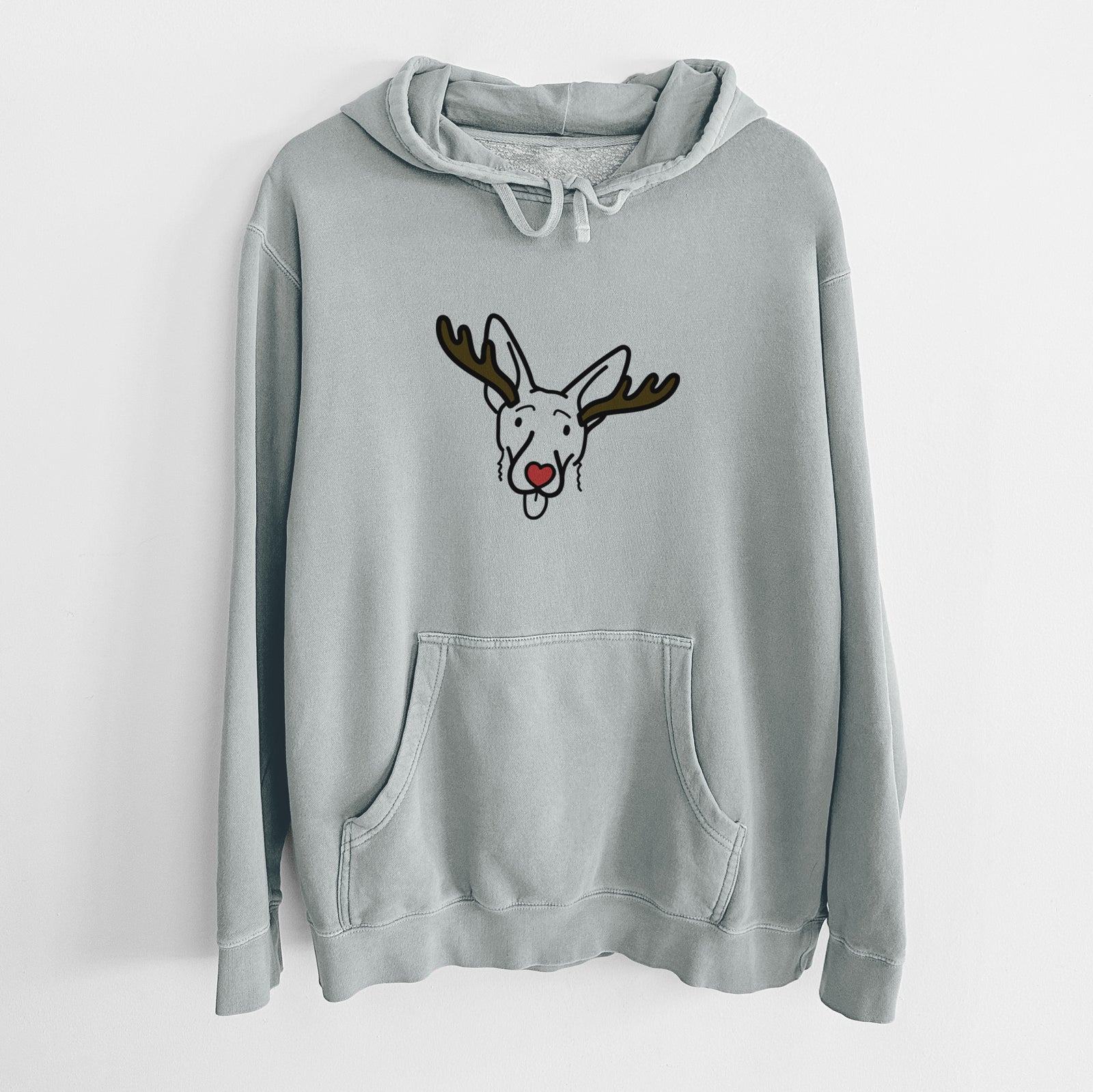 Minimalist line drawing of Rosie the Shepherd Mix with reindeer antlers and a red nose on a Sage Unisex pigment dyed hoodie