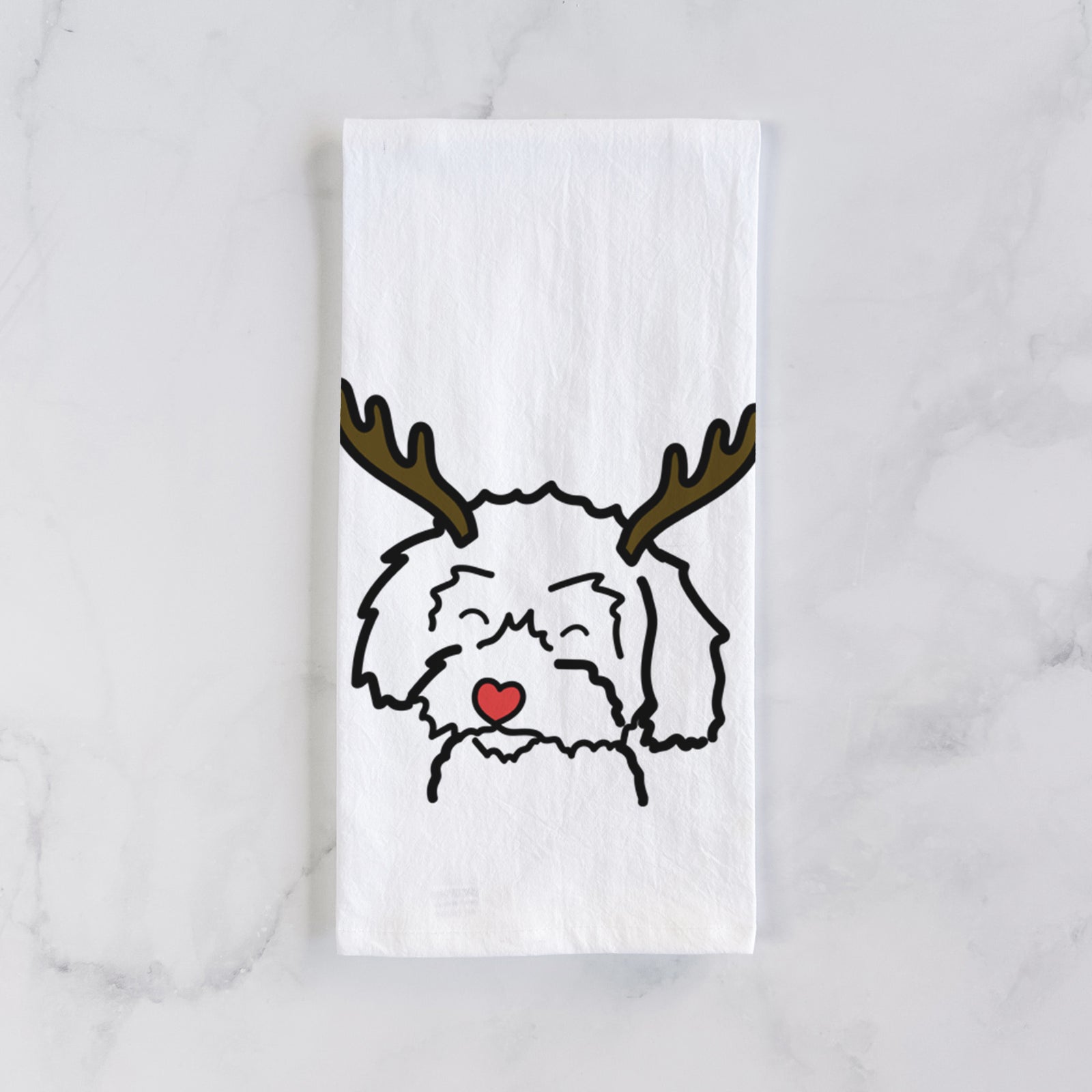 Minimalist line drawing of a Schnoodle with reindeer antlers and a red nose on a tea towel