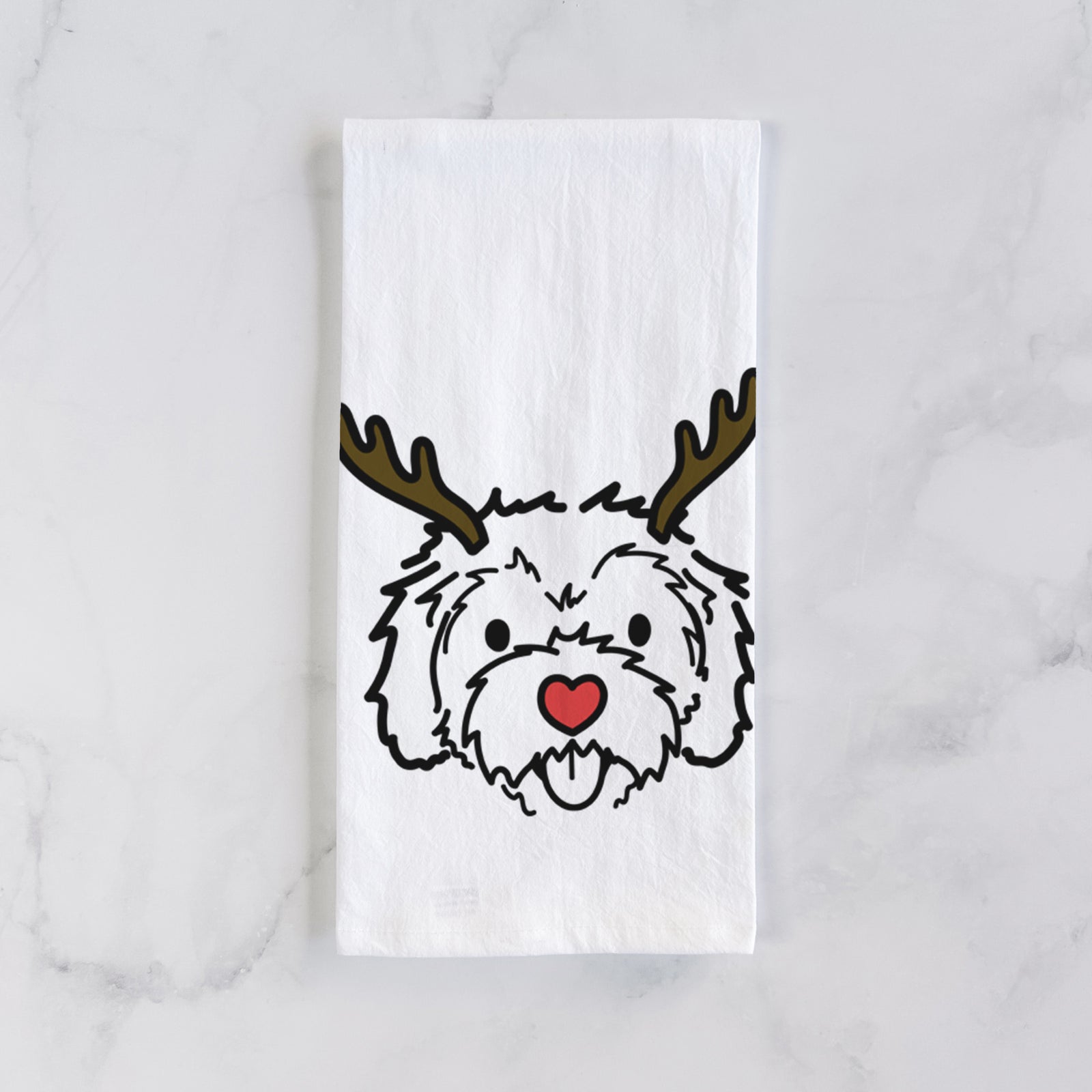 Minimalist line drawing of Sprinkles the Cockapoo with reindeer antlers and a red nose on a tea towel