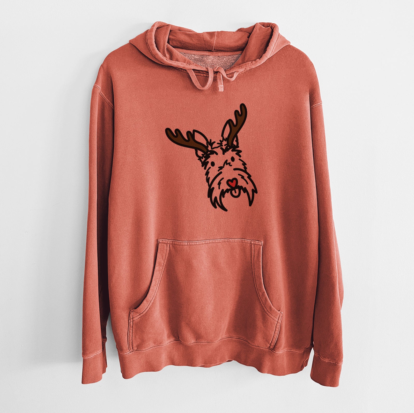 Minimalist line drawing of Thistle the Scottish Terrier with reindeer antlers and a red nose on an Amber Unisex pigment dyed hoodie