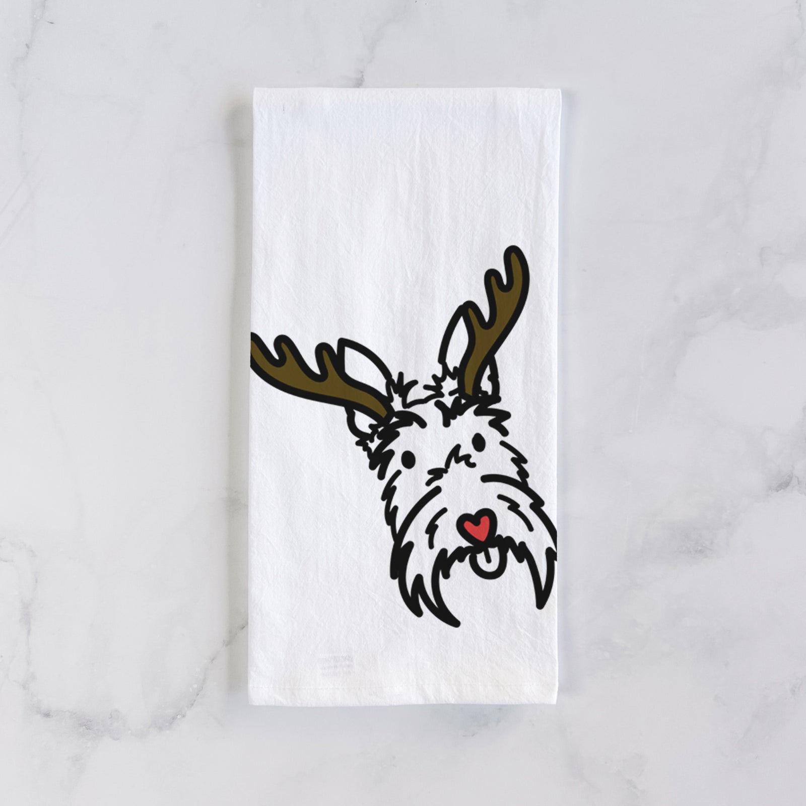 Minimalist line drawing of Thistle the Scottish Terrier with reindeer antlers and a red nose on a tea towel