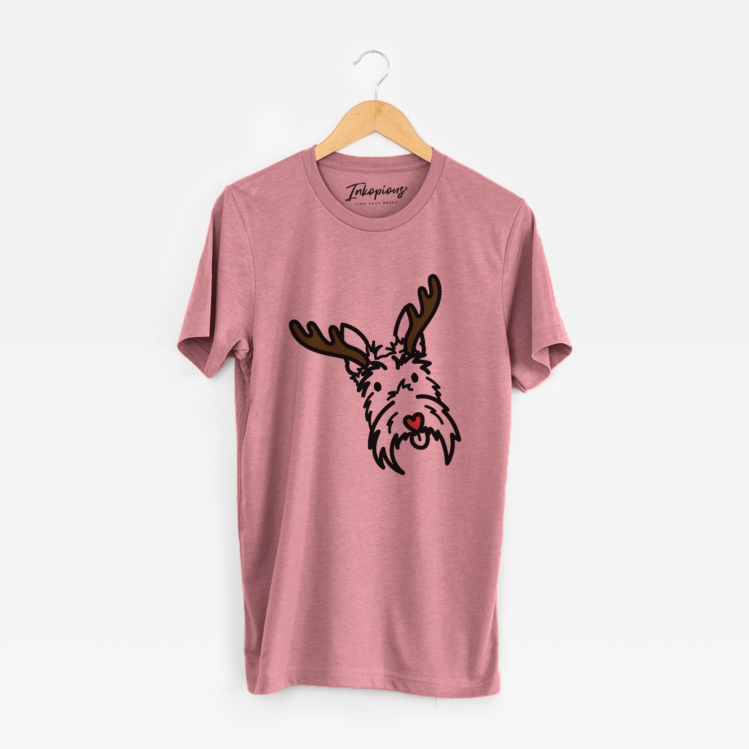 Minimalist line drawing of Thistle the Scottish Terrier with reindeer antlers and a red nose on a Mauve Unisex crewneck