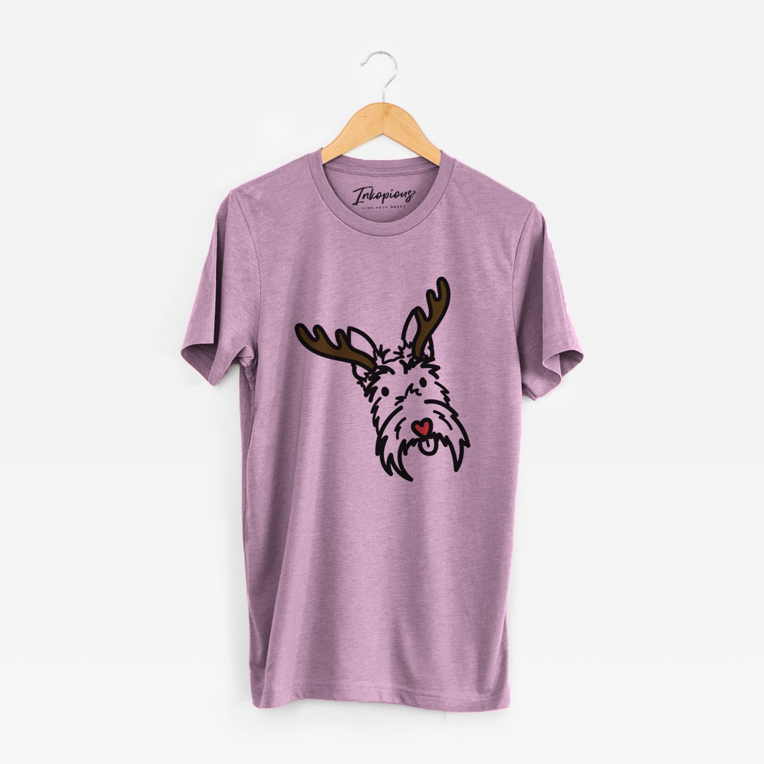 Minimalist line drawing of Thistle the Scottish Terrier with reindeer antlers and a red nose on an Orchid Unisex crewneck