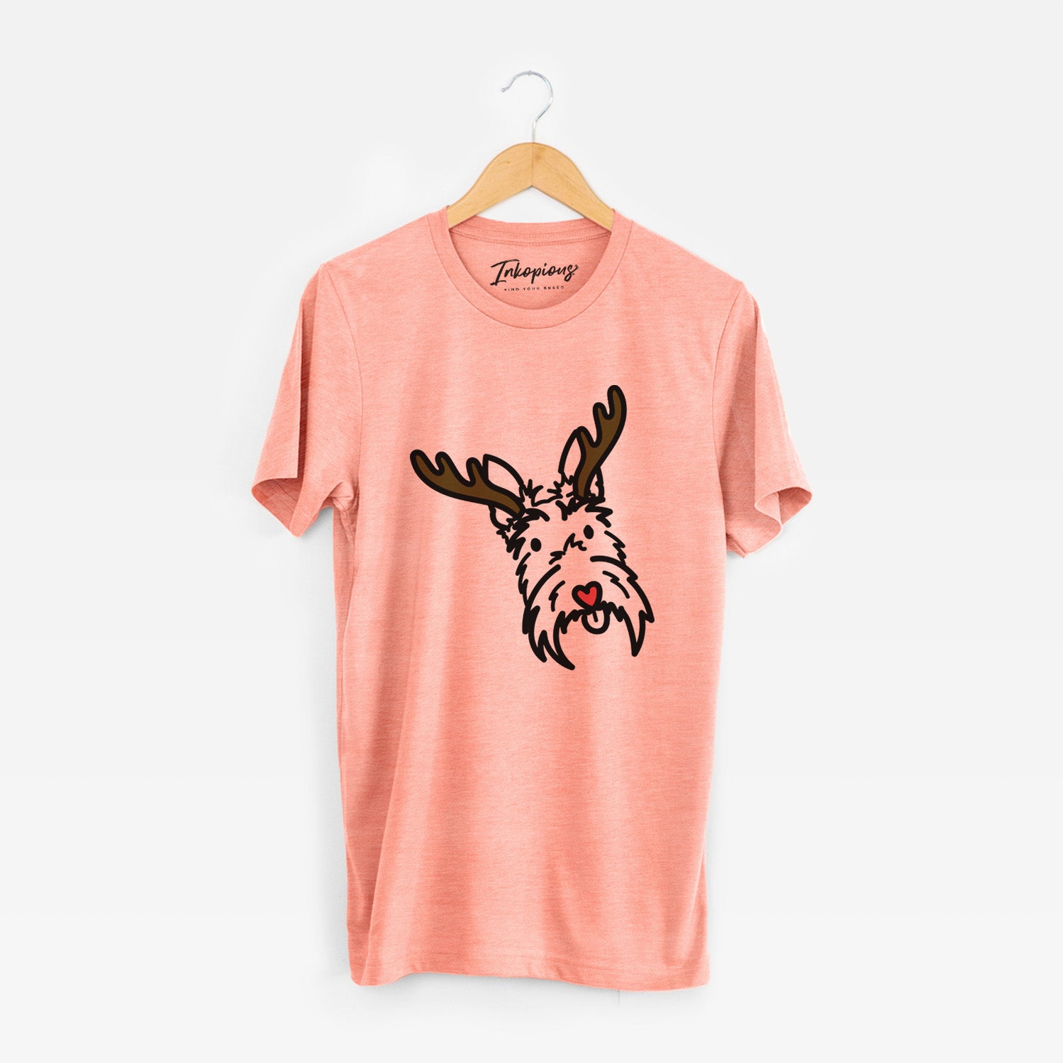 Minimalist line drawing of Thistle the Scottish Terrier with reindeer antlers and a red nose on a Sunset Unisex crewneck
