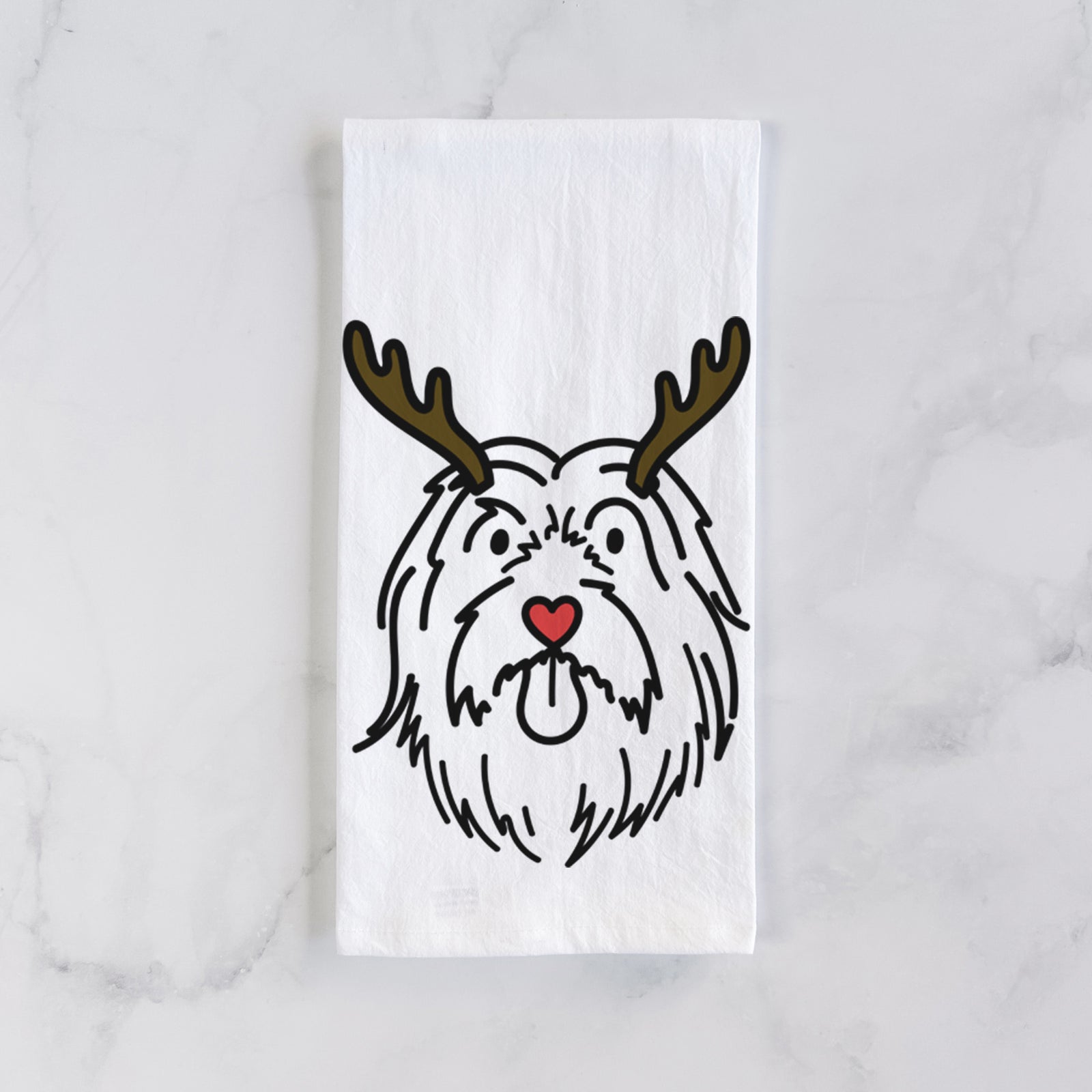 Minimalist line drawing of Tucker the Bearded Collie with reindeer antlers and a red nose on a tea towel