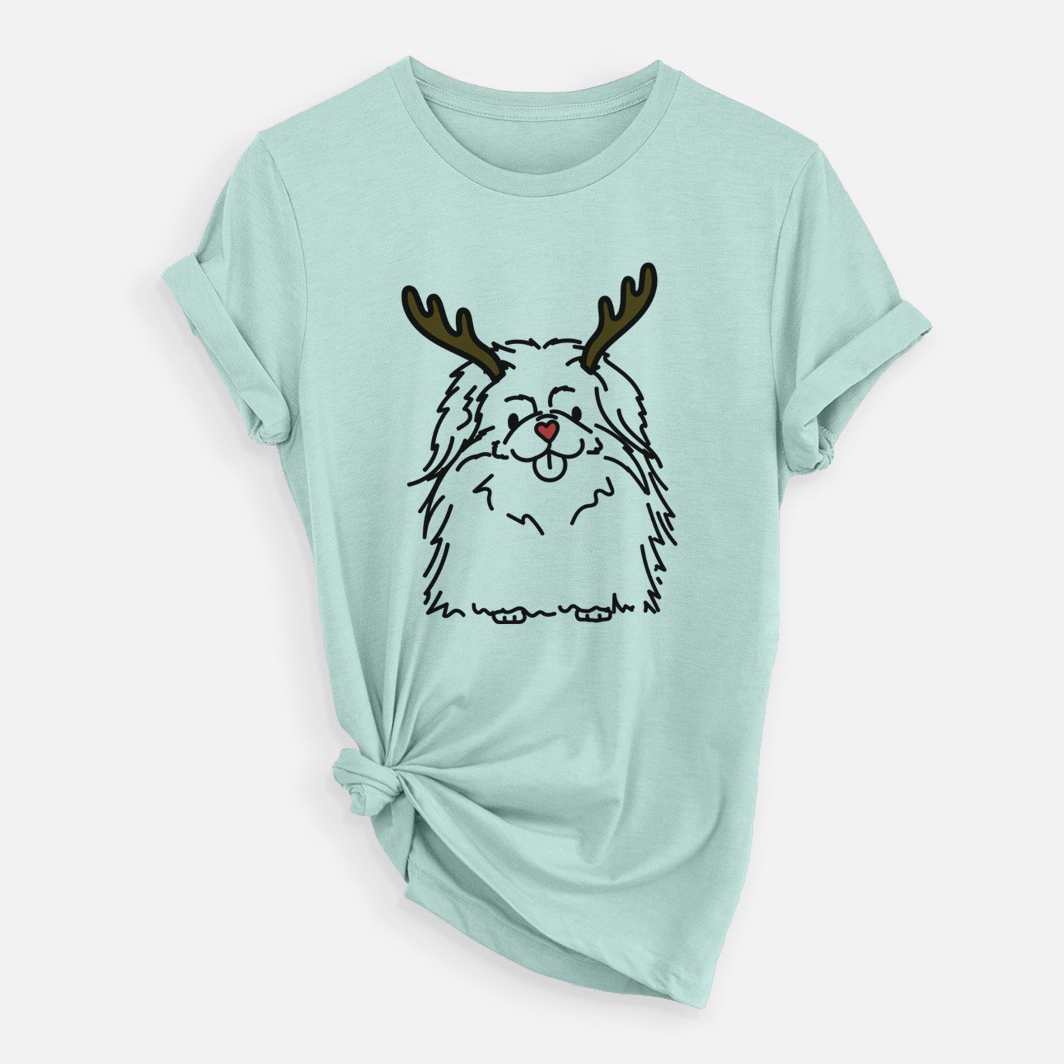 Minimalist line drawing of Viv the Pekingese with reindeer antlers and a red nose on a Heather Sage Unisex crewneck