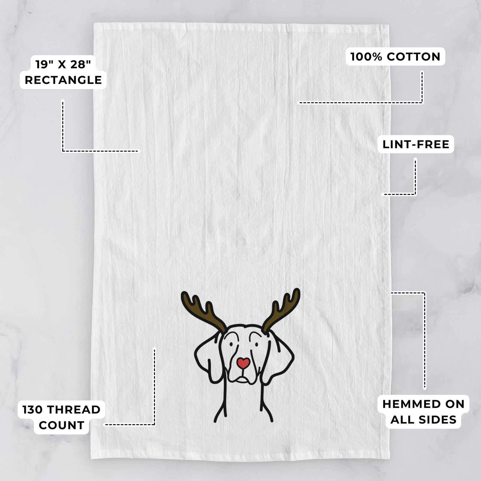 Minimalist line drawing of a Weimaraner with reindeer antlers and a red nose on a tea towel, with feature callouts: 19 x 28 inch rectangle, 100% cotton, lint-free, 120 thread count, hemmed on all sides