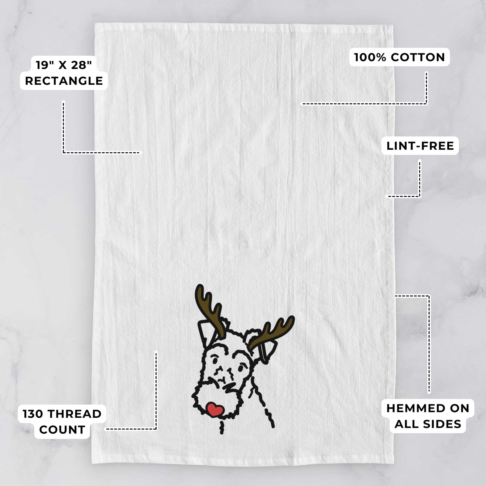 Minimalist line drawing of a Wire Fox Terrier with reindeer antlers and a red nose on a tea towel, with feature callouts: 19 x 28 inch rectangle, 100% cotton, lint-free, 120 thread count, hemmed on all sides