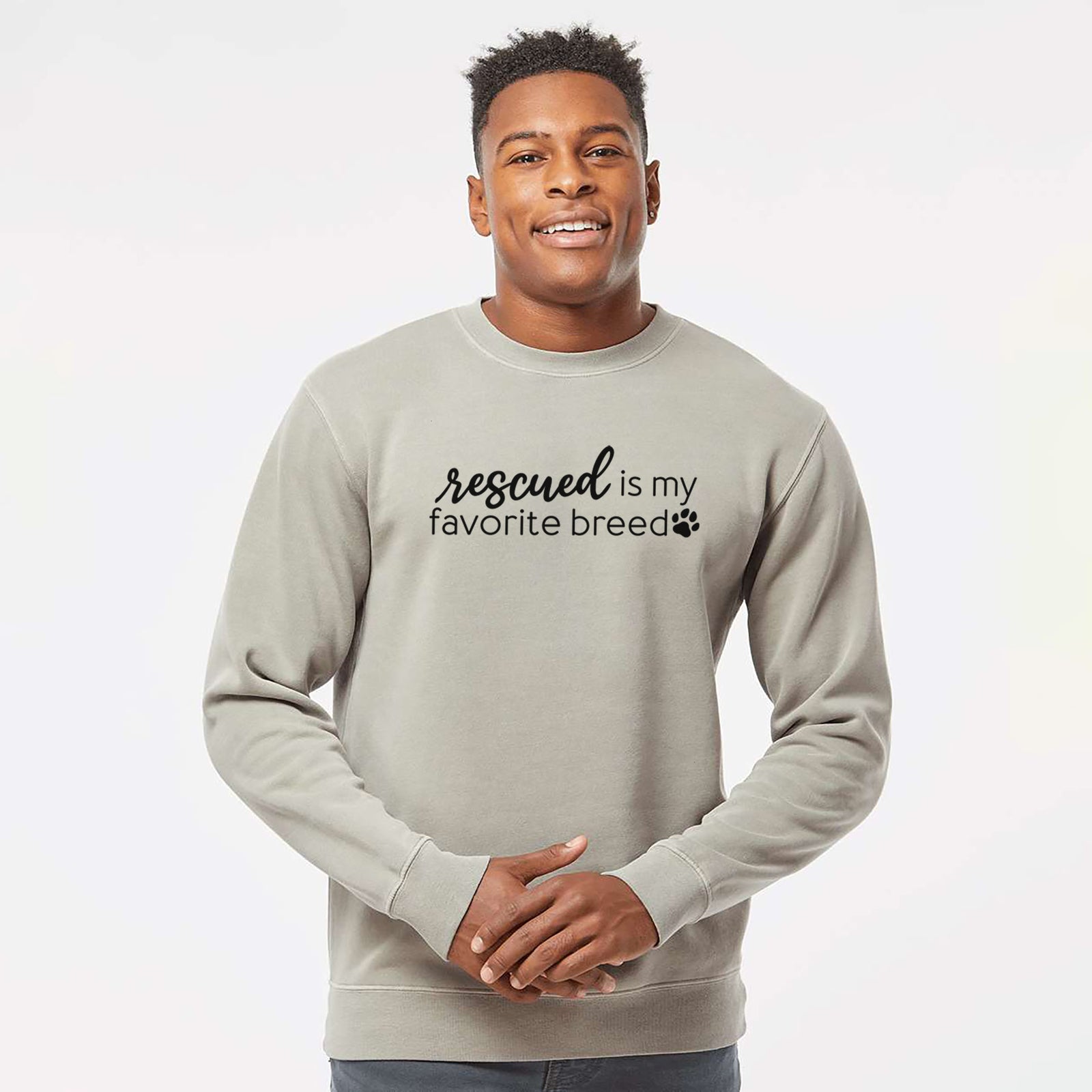 'Rescued is My Favorite Breed' design on a Cement Unisex pigment dyed crew sweatshirt
