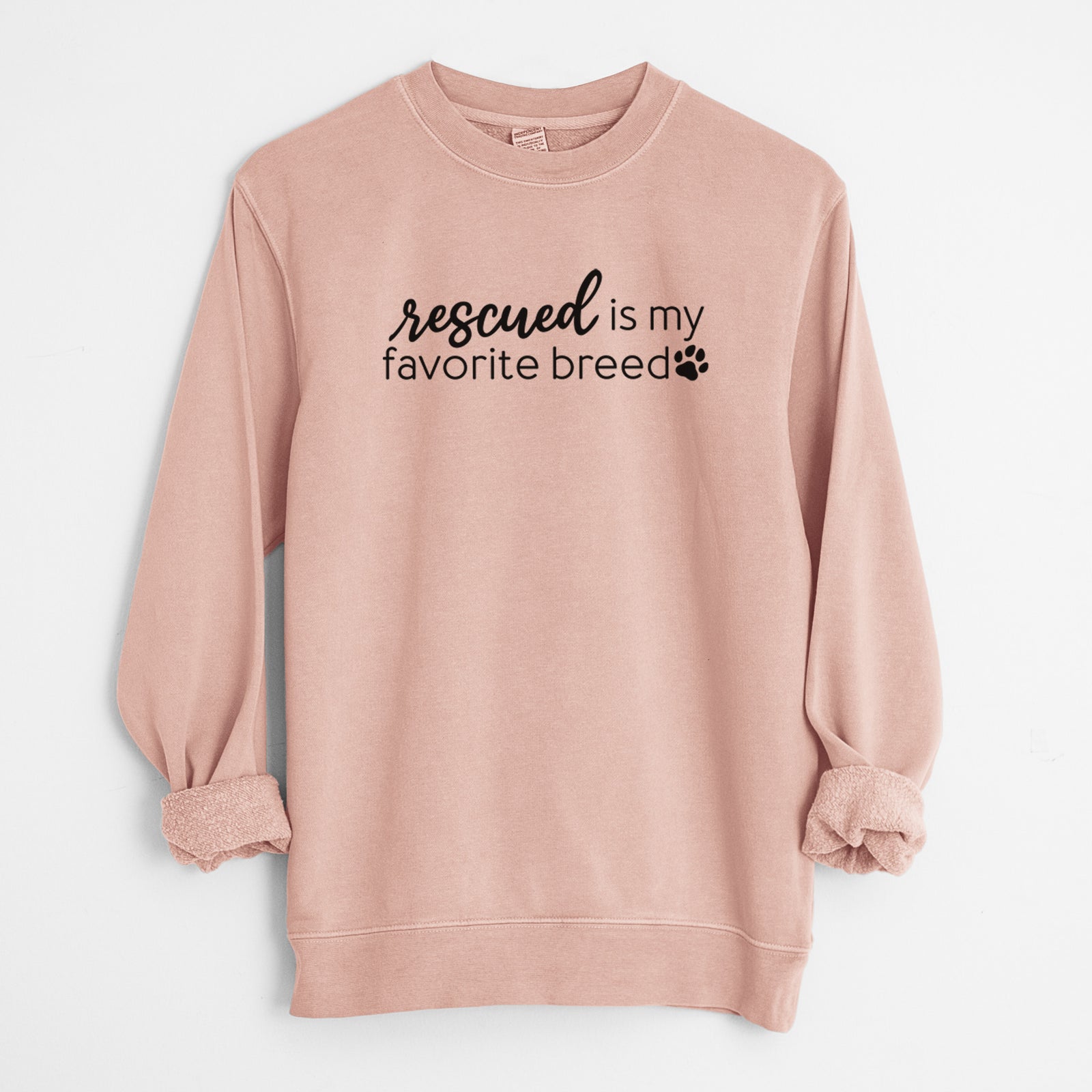 'Rescued is My Favorite Breed' design on a Dusty Pink Unisex pigment dyed crew sweatshirt