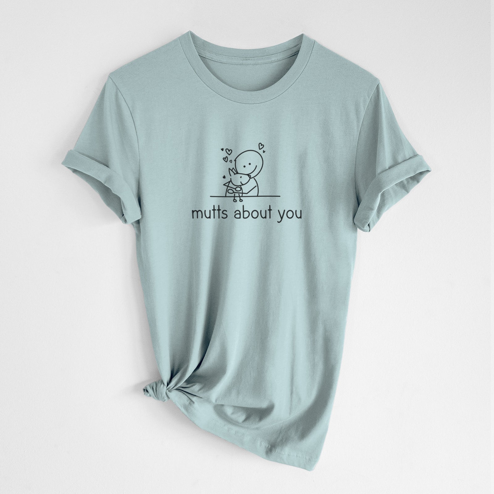 'Mutts About You' design on a Dusty Blue Unisex crewneck, worn by a woman