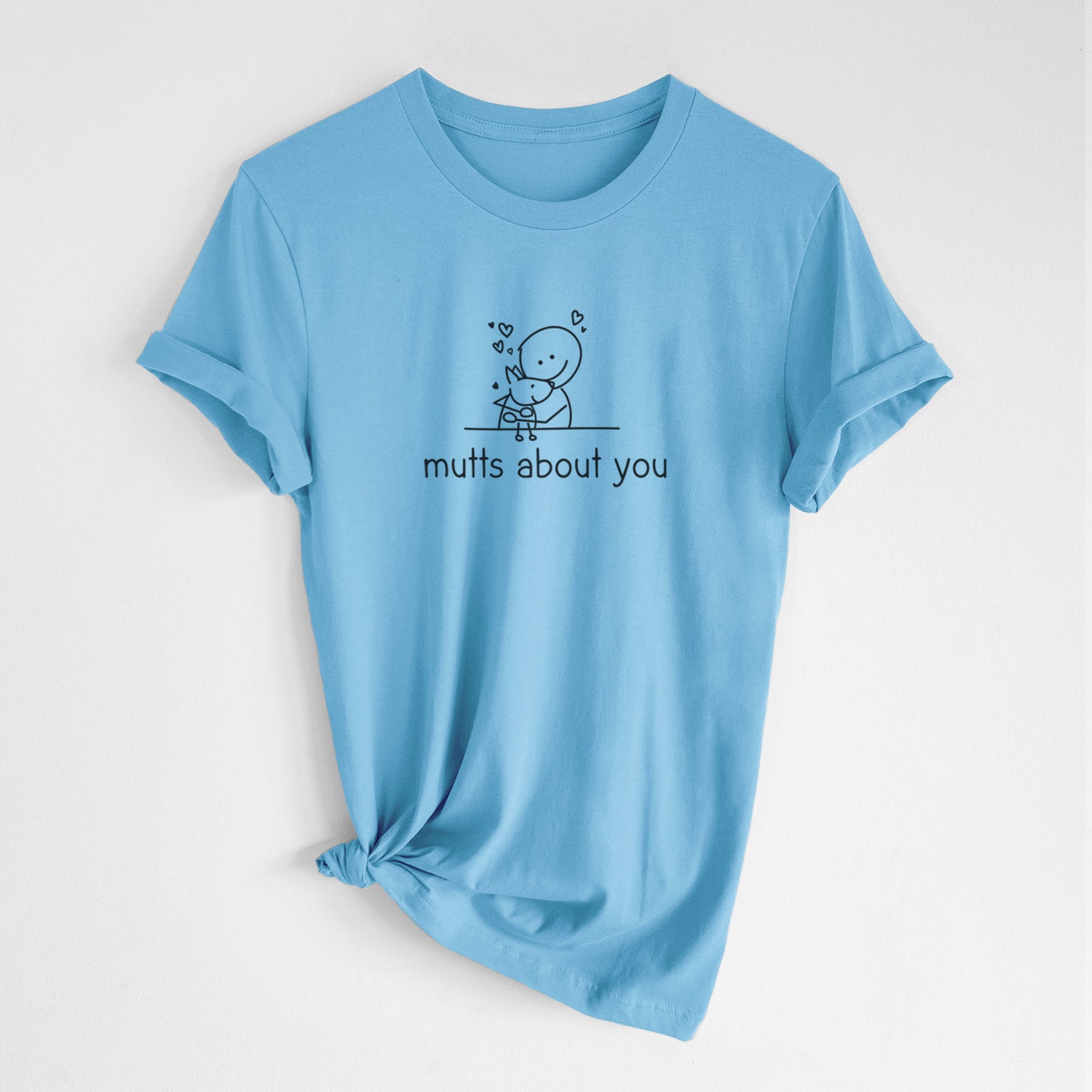 'Mutts About You' design on an Ocean Blue Unisex crewneck, worn by a woman