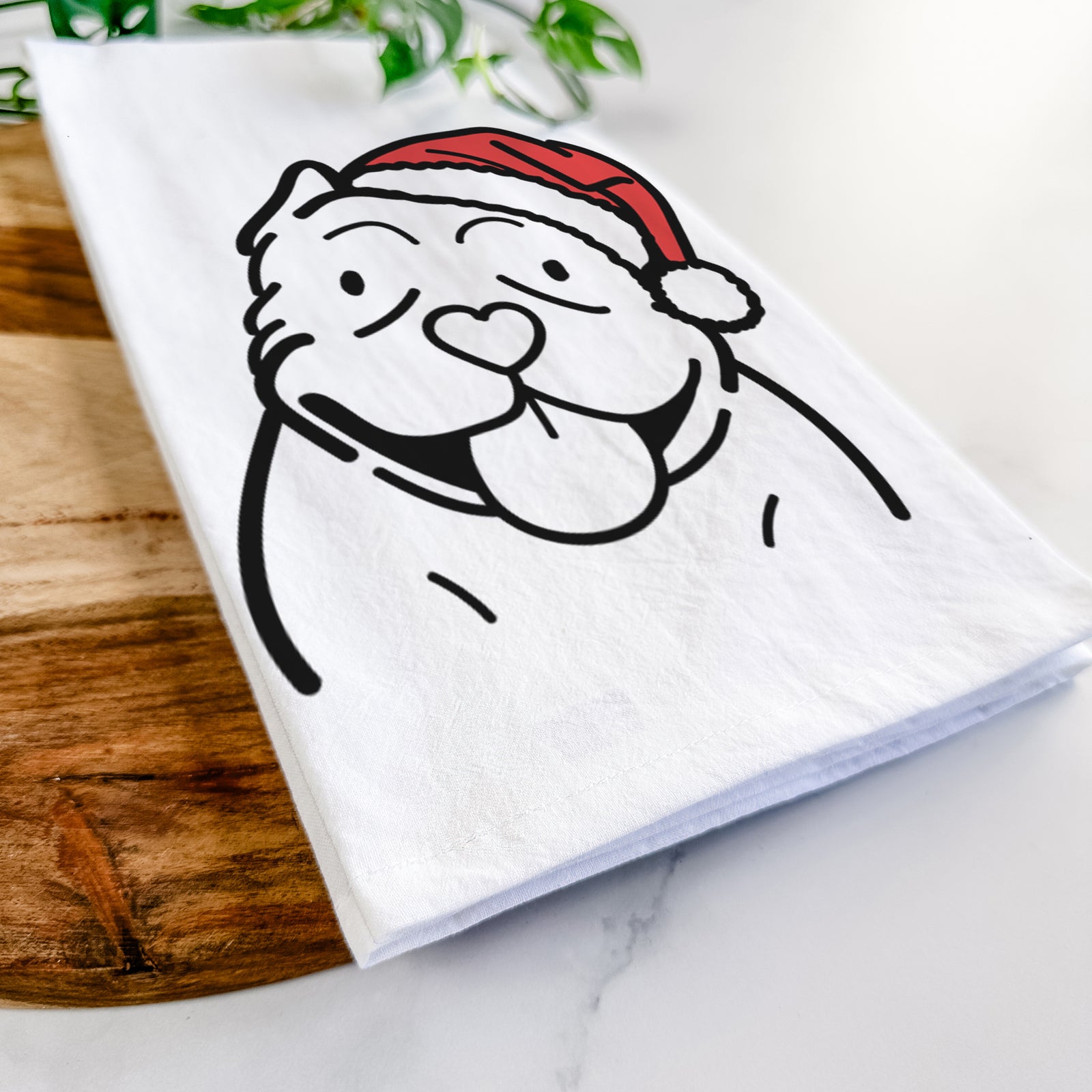Minimalist line drawing of an American Bully wearing a Santa hat on a tea towel