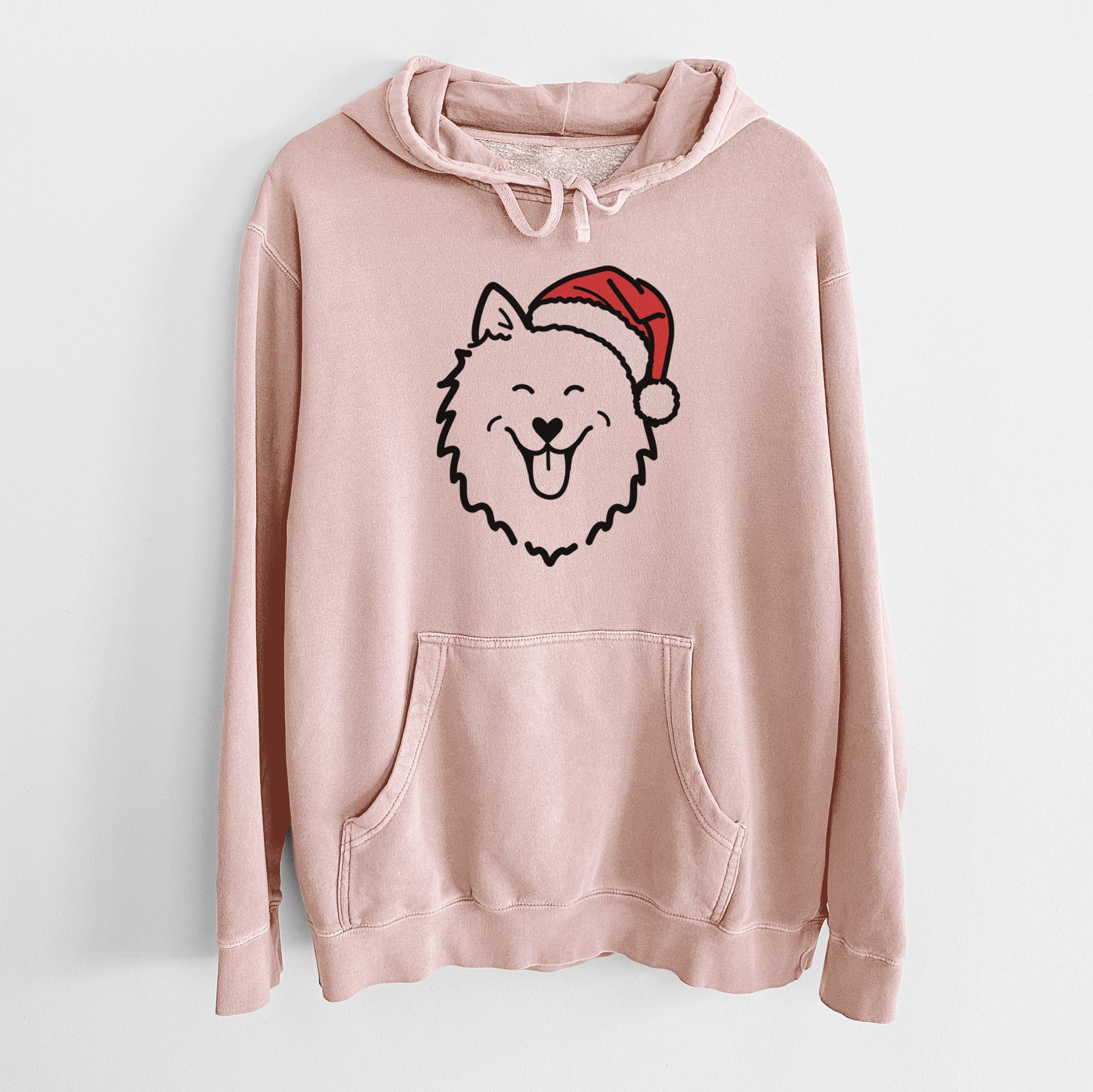 Minimalist line drawing of an American Eskimo wearing a Santa hat on a Dusty Pink Unisex pigment dyed hoodie