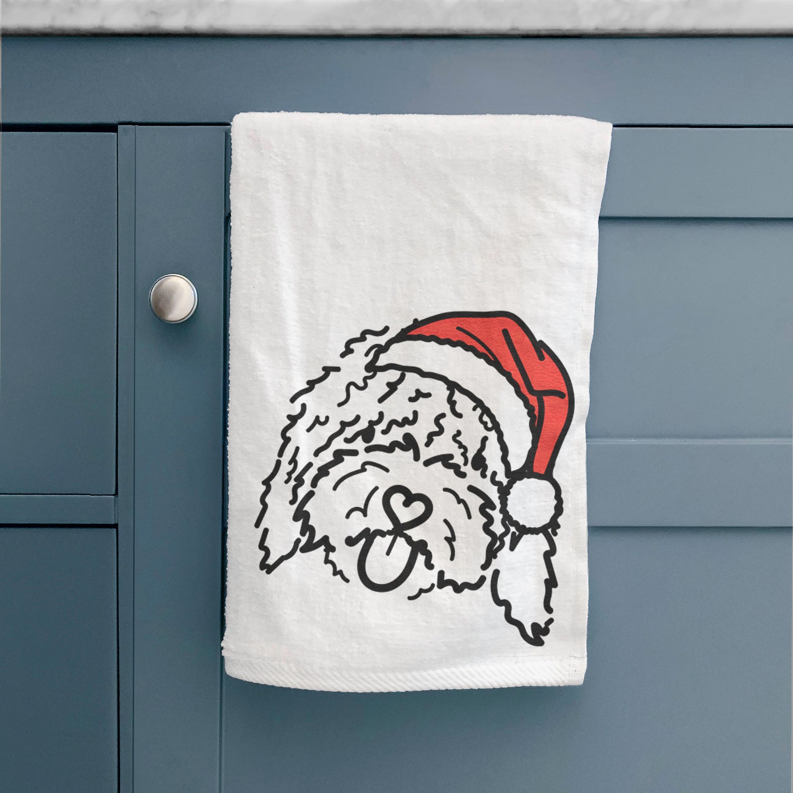 Minimalist line drawing of Antonio the Spanish Water Dog wearing a Santa hat on a decorative hand towel