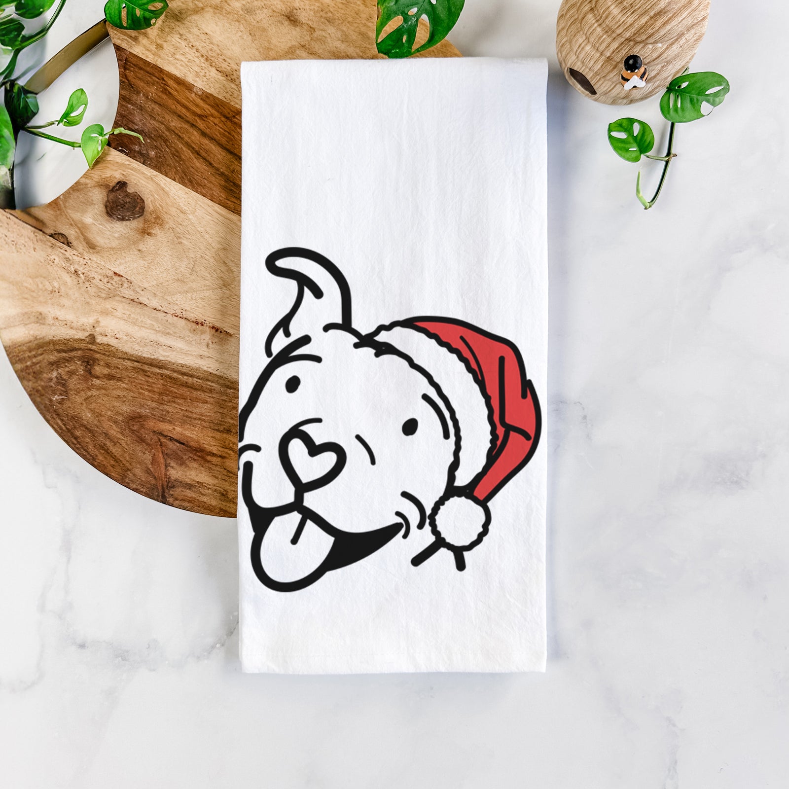 Minimalist line drawing of Arlo the Pitbull wearing a Santa hat on a tea towel