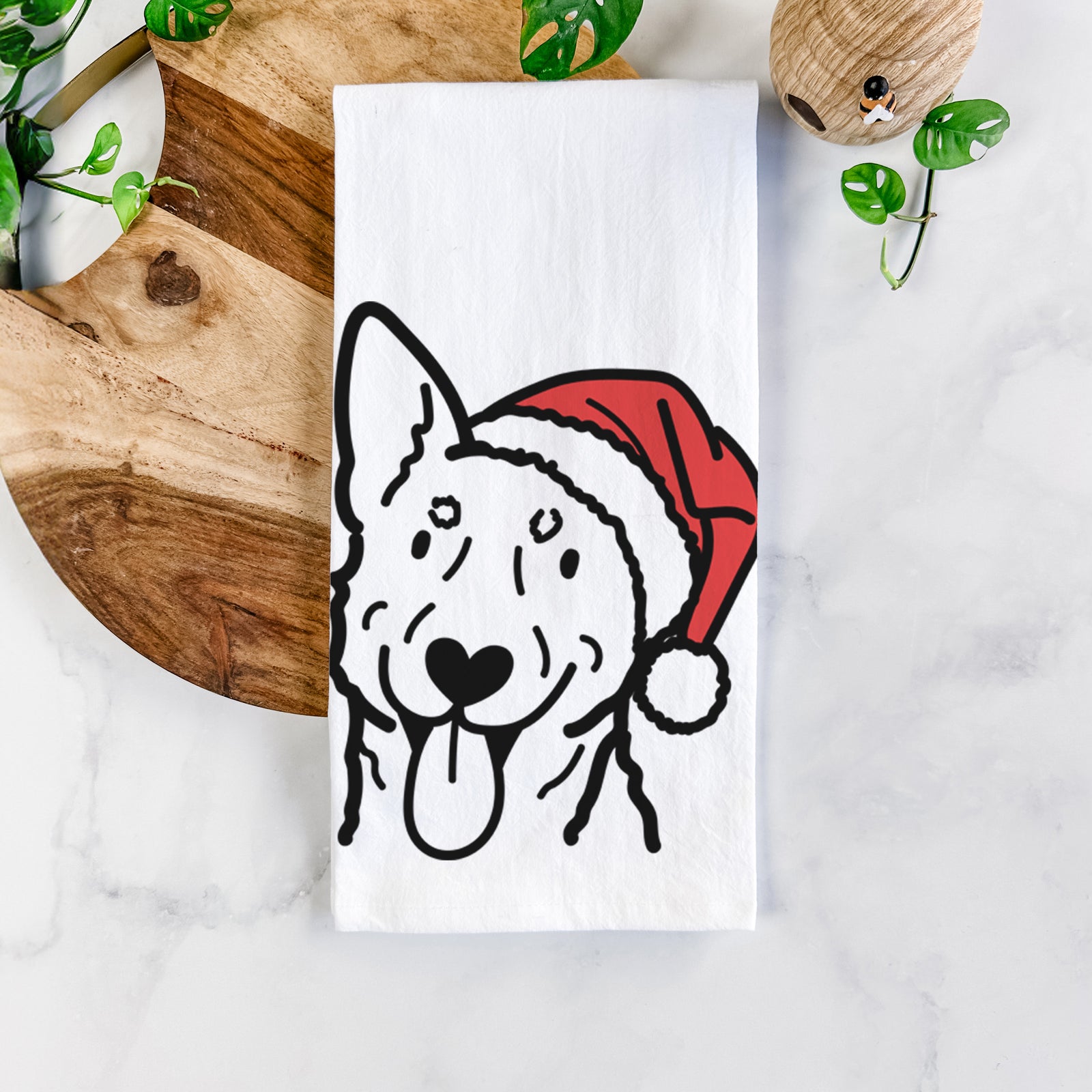 Minimalist line drawing of an Australian Cattle Dog wearing a Santa hat on a tea towel