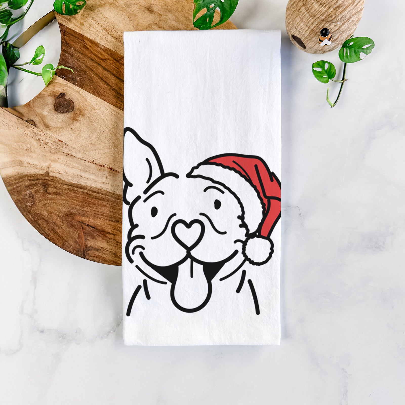 Minimalist line drawing of Basil the Pitbull wearing a Santa hat on a tea towel