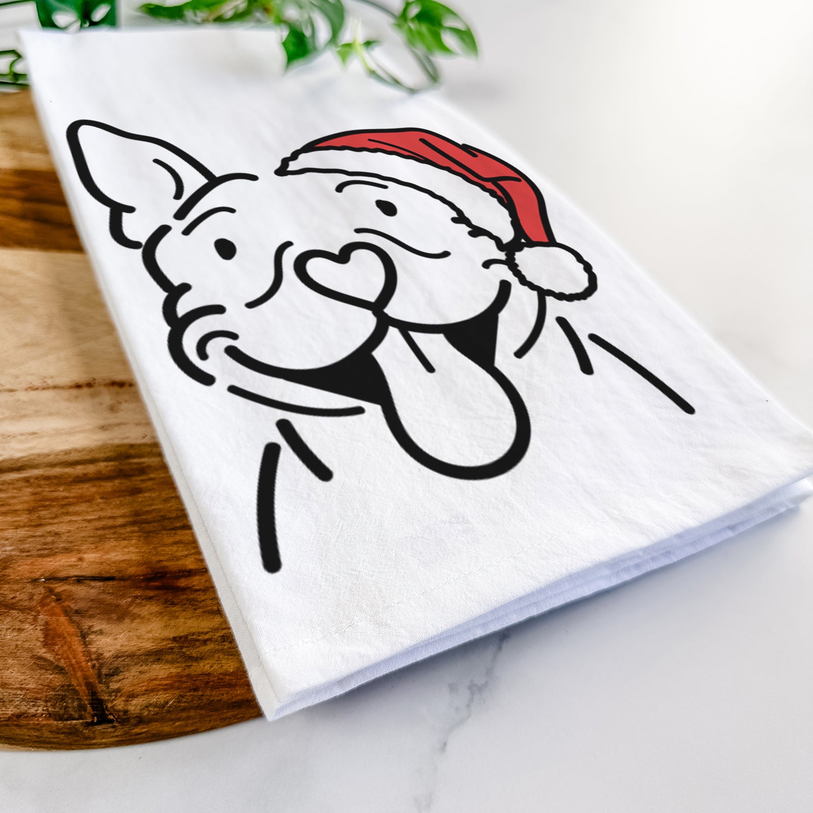 Minimalist line drawing of Basil the Pitbull wearing a Santa hat on a tea towel