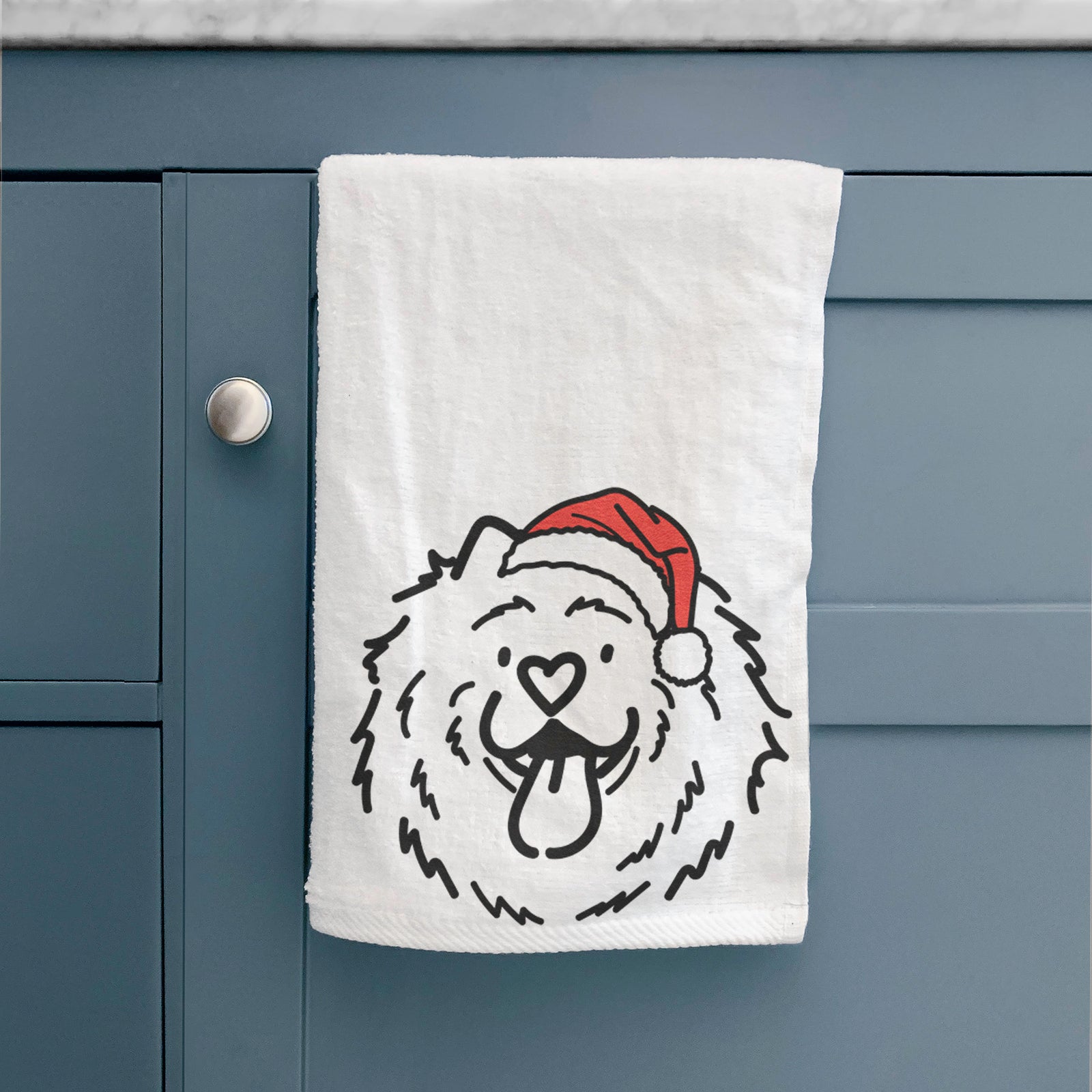 Minimalist line drawing of Bear the Chow Chow wearing a Santa hat on a hand towel