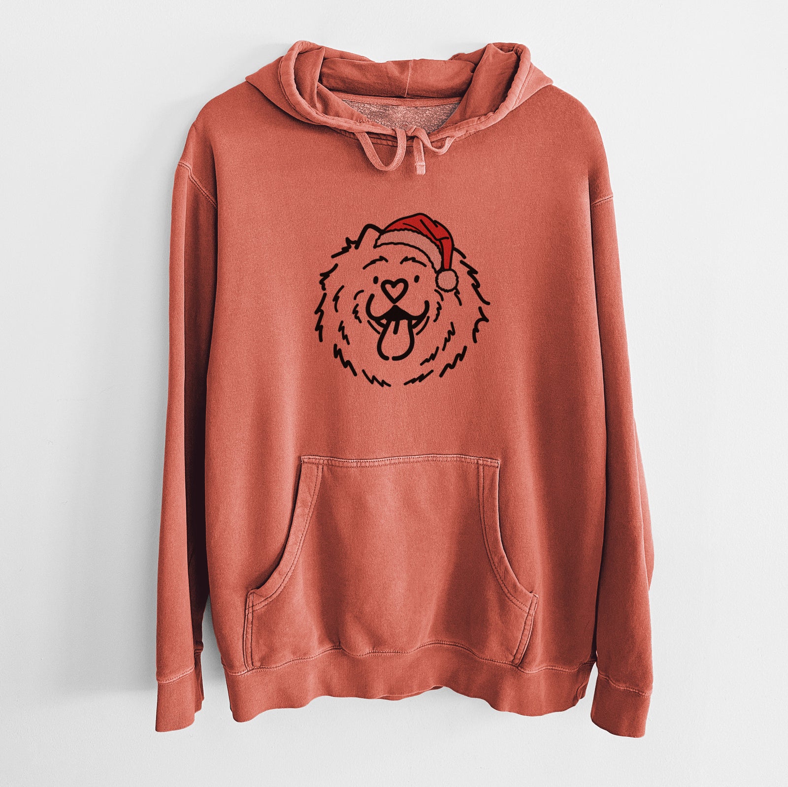 Minimalist line drawing of Bear the Chow Chow wearing a Santa hat on an Amber Unisex pigment dyed hoodie