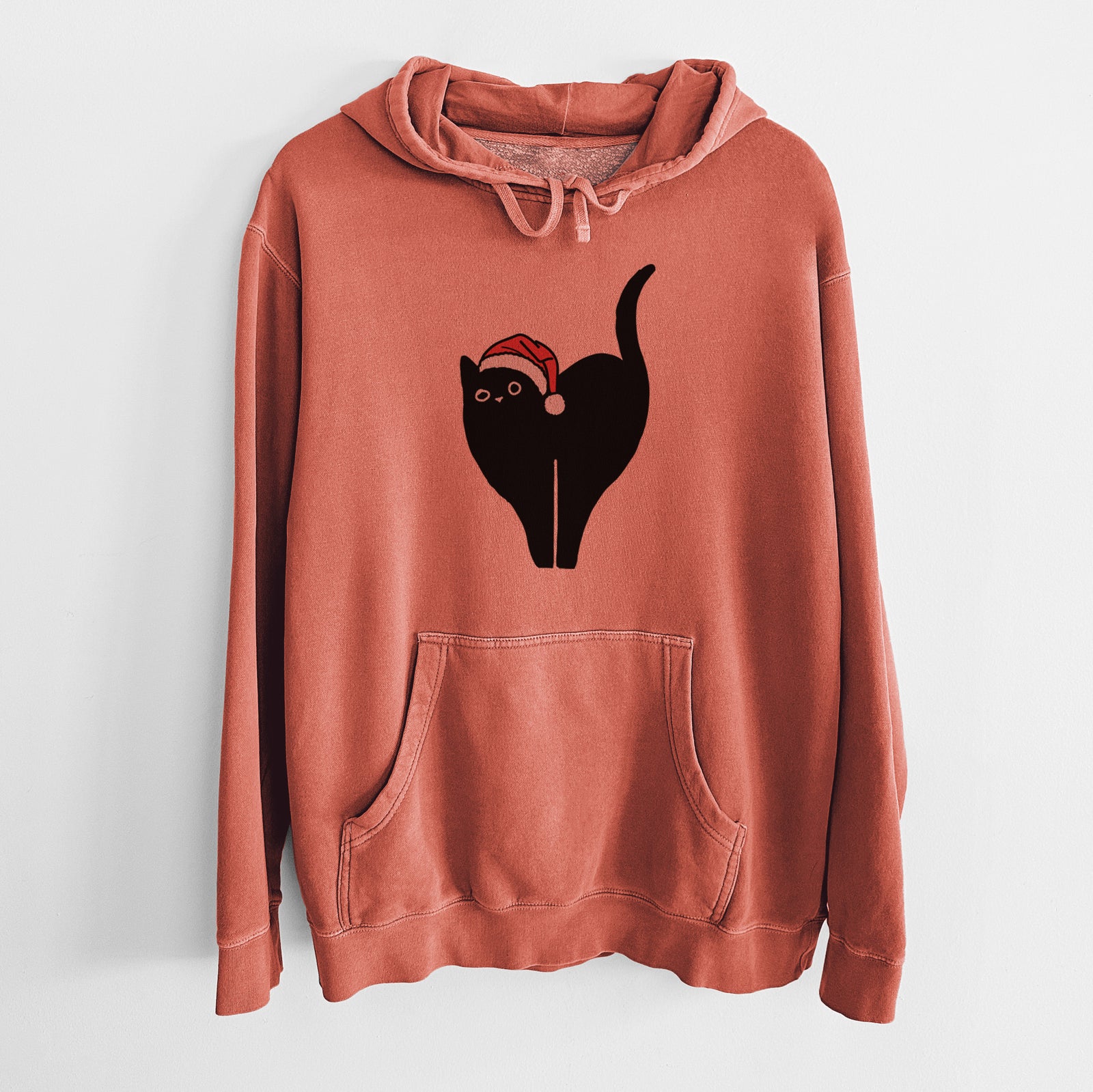 Minimalist line drawing of Bella the Black Cat wearing a Santa hat on an Amber Unisex pigment dyed hoodie