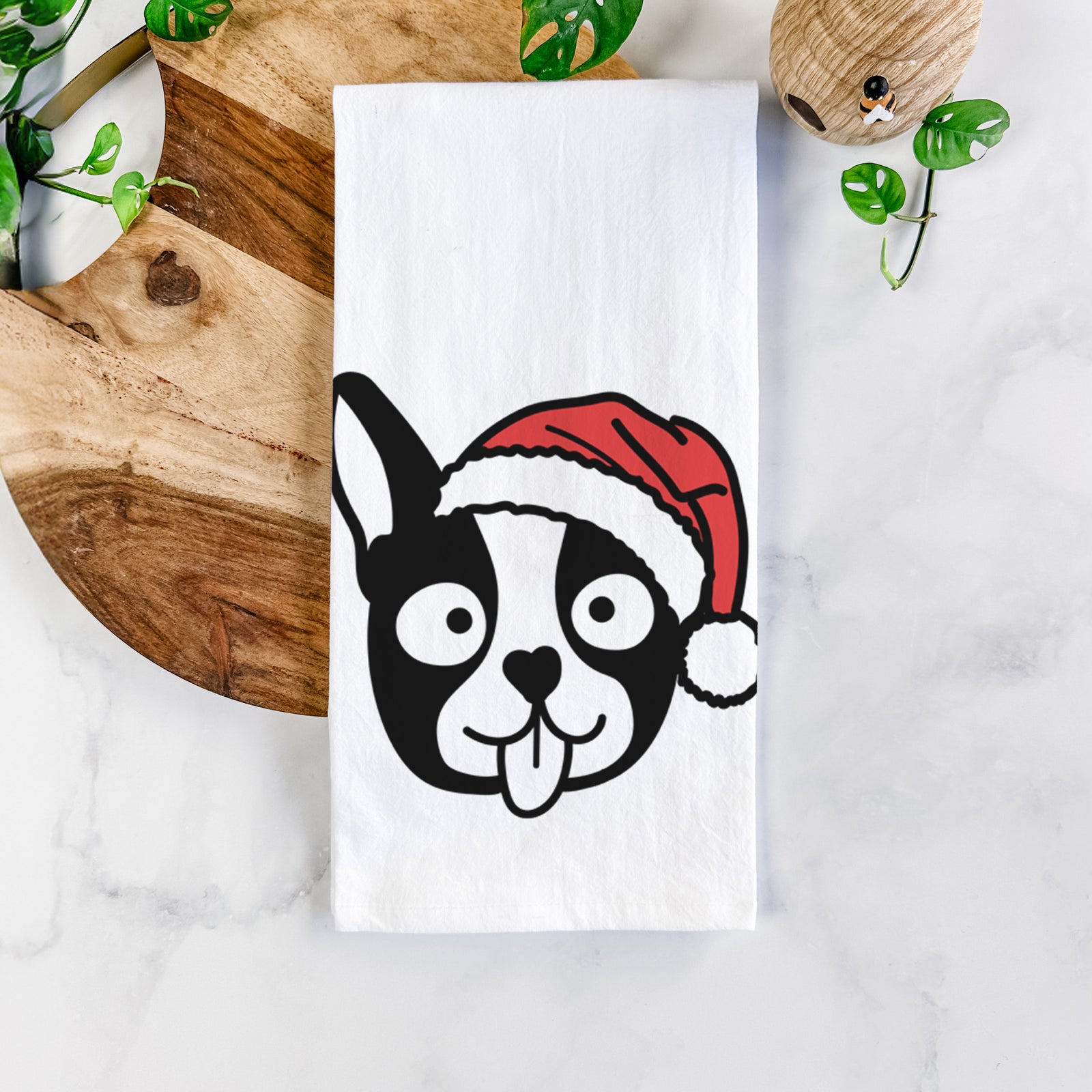 Minimalist line drawing of a Boston Terrier wearing a Santa hat on a tea towel