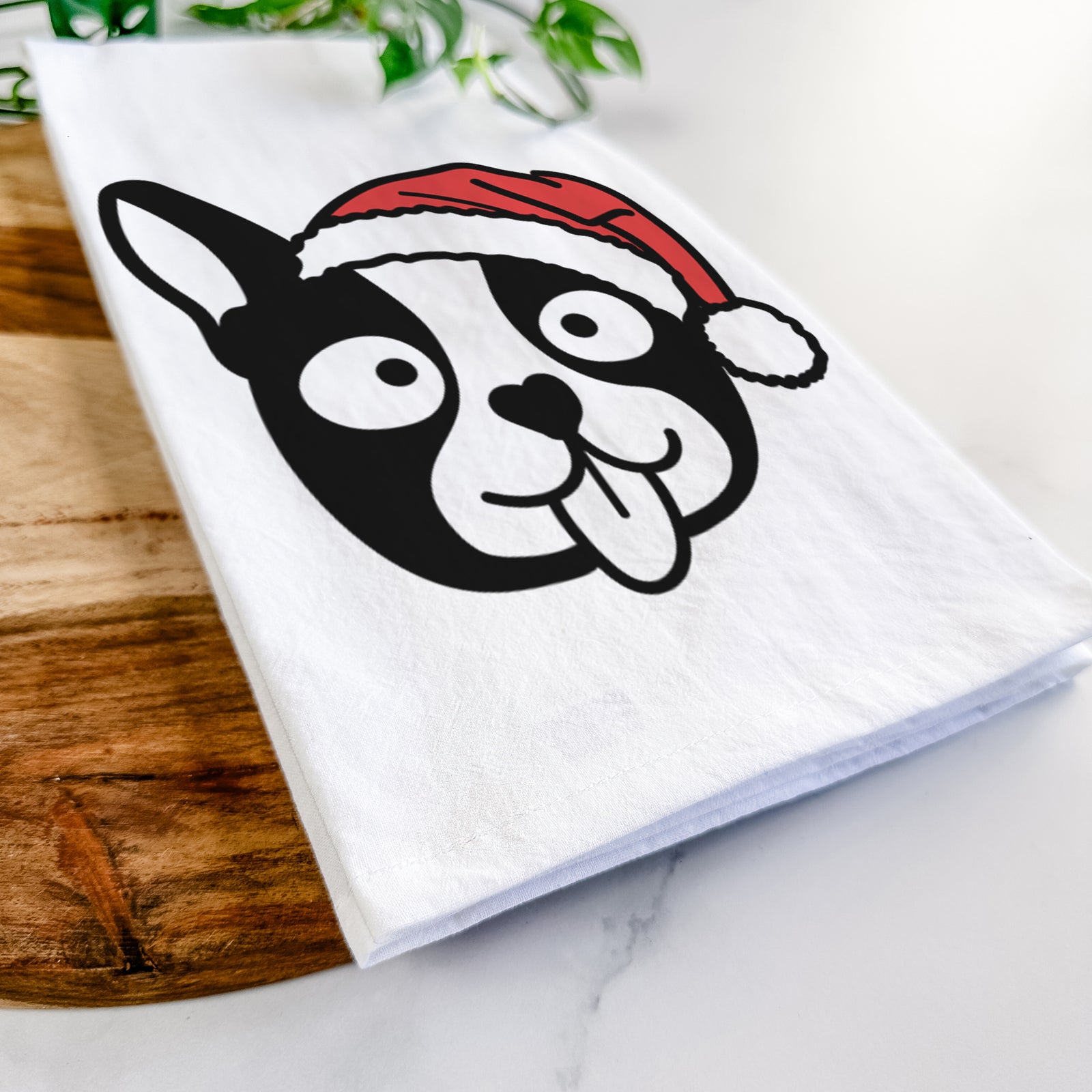 Minimalist line drawing of a Boston Terrier wearing a Santa hat on a tea towel