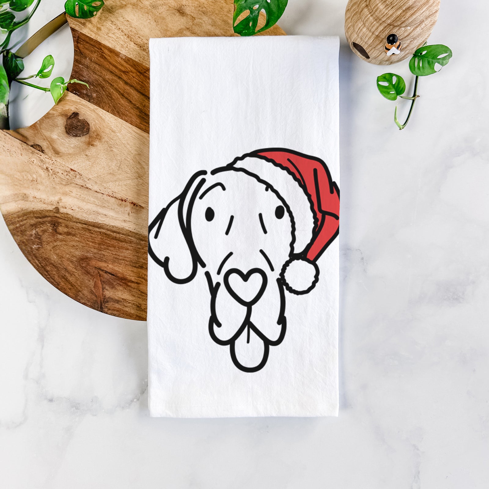 Minimalist line drawing of Bruce the Great Dane wearing a Santa hat on a tea towel