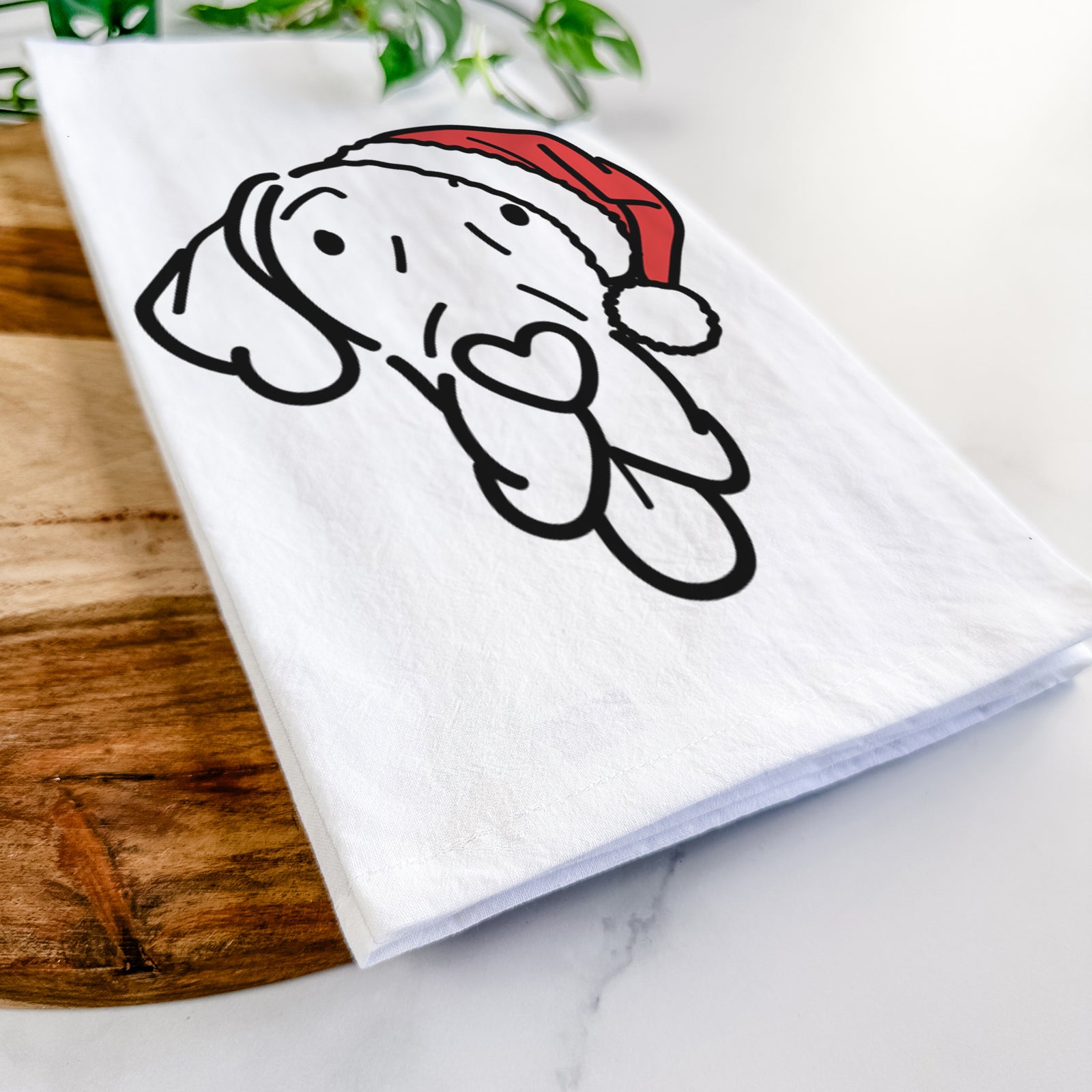 Minimalist line drawing of Bruce the Great Dane wearing a Santa hat on a tea towel