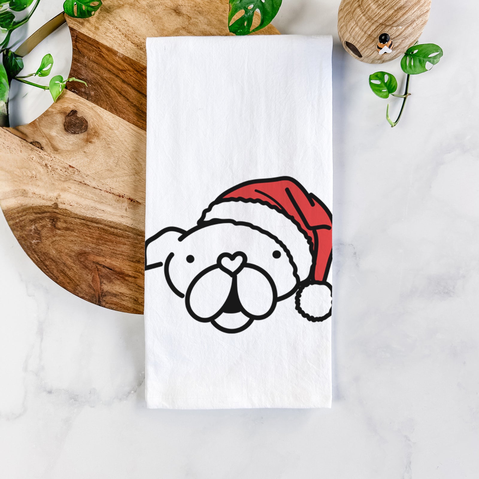 Minimalist line drawing of an English Bulldog wearing a Santa hat on a tea towel