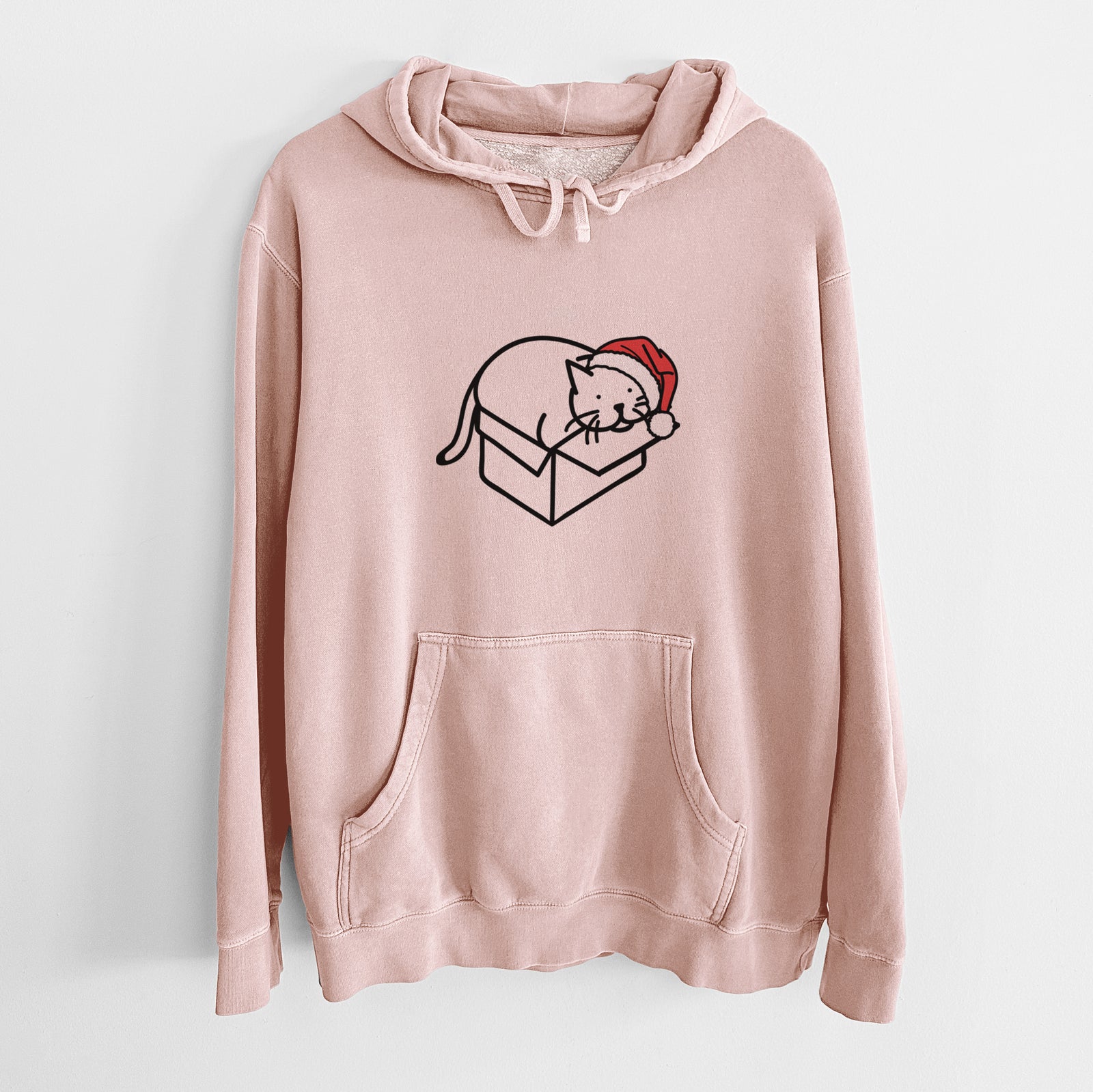 Minimalist line drawing of Charlie the Cat in a Box wearing a Santa hat on a Dusty Pink Unisex pigment dyed hoodie