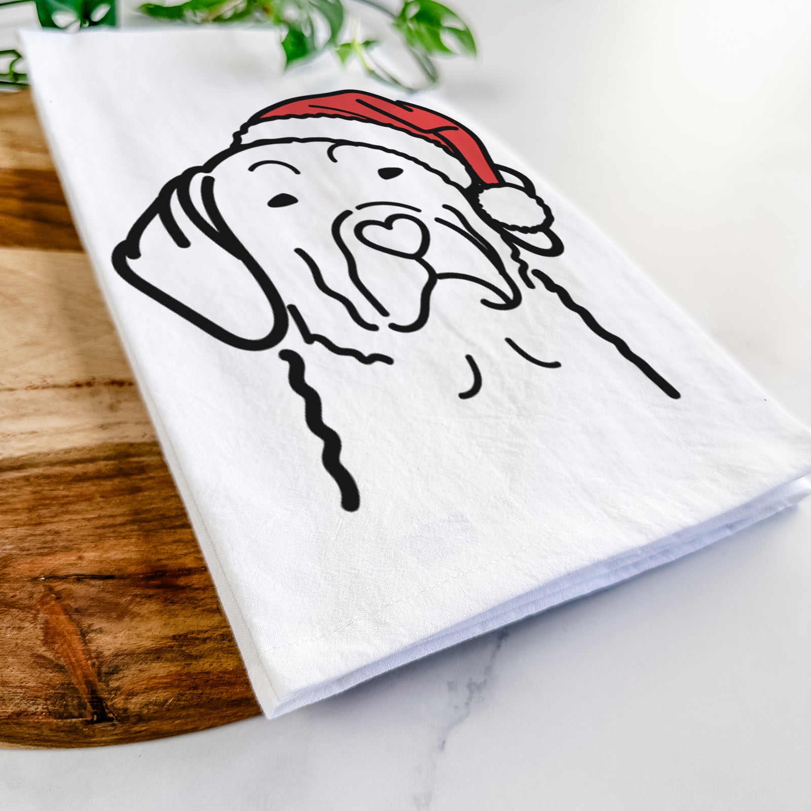 Minimalist line drawing of a Chesapeake Bay Retriever wearing a Santa hat on a tea towel