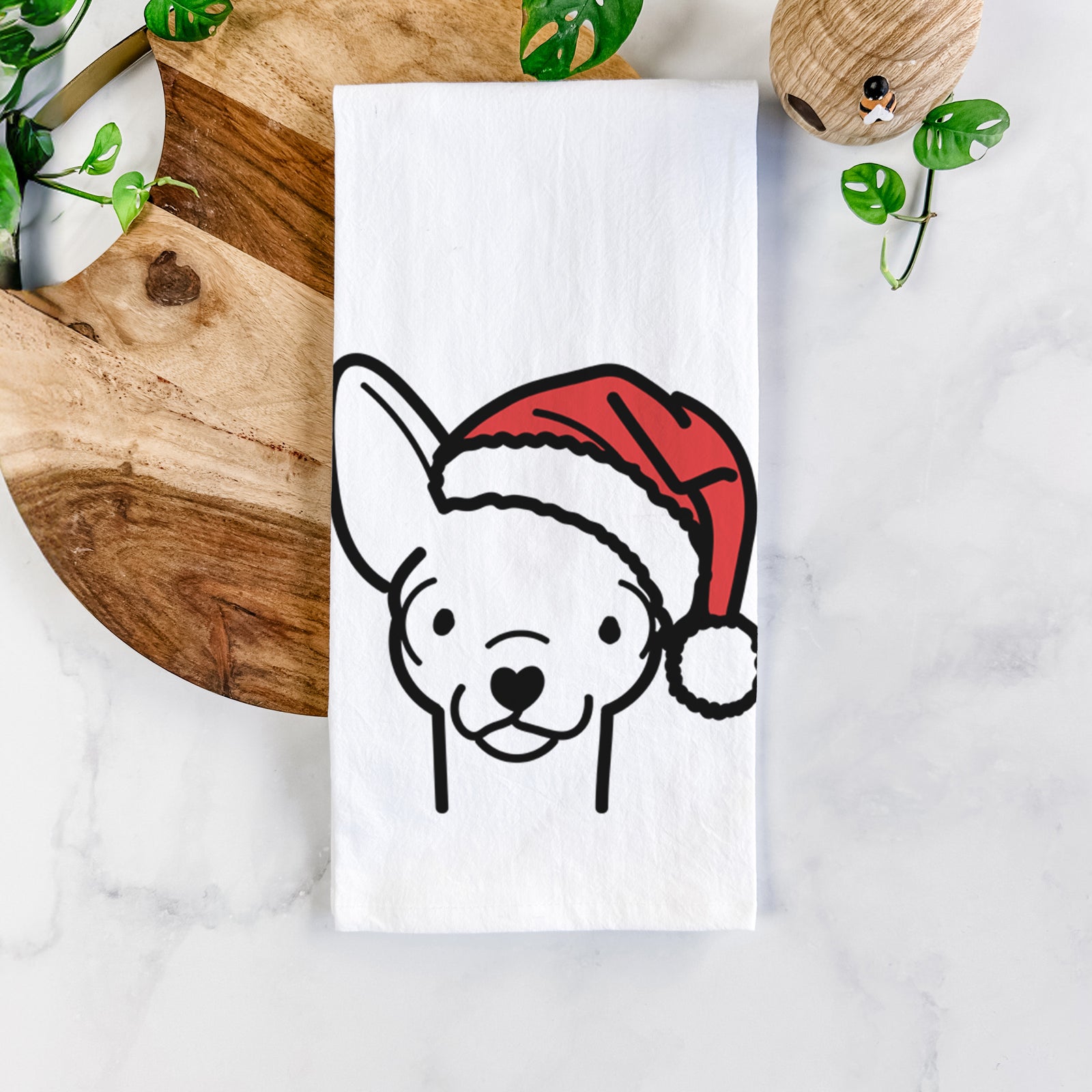 Minimalist line drawing of a Chihuahua wearing a Santa hat on a tea towel