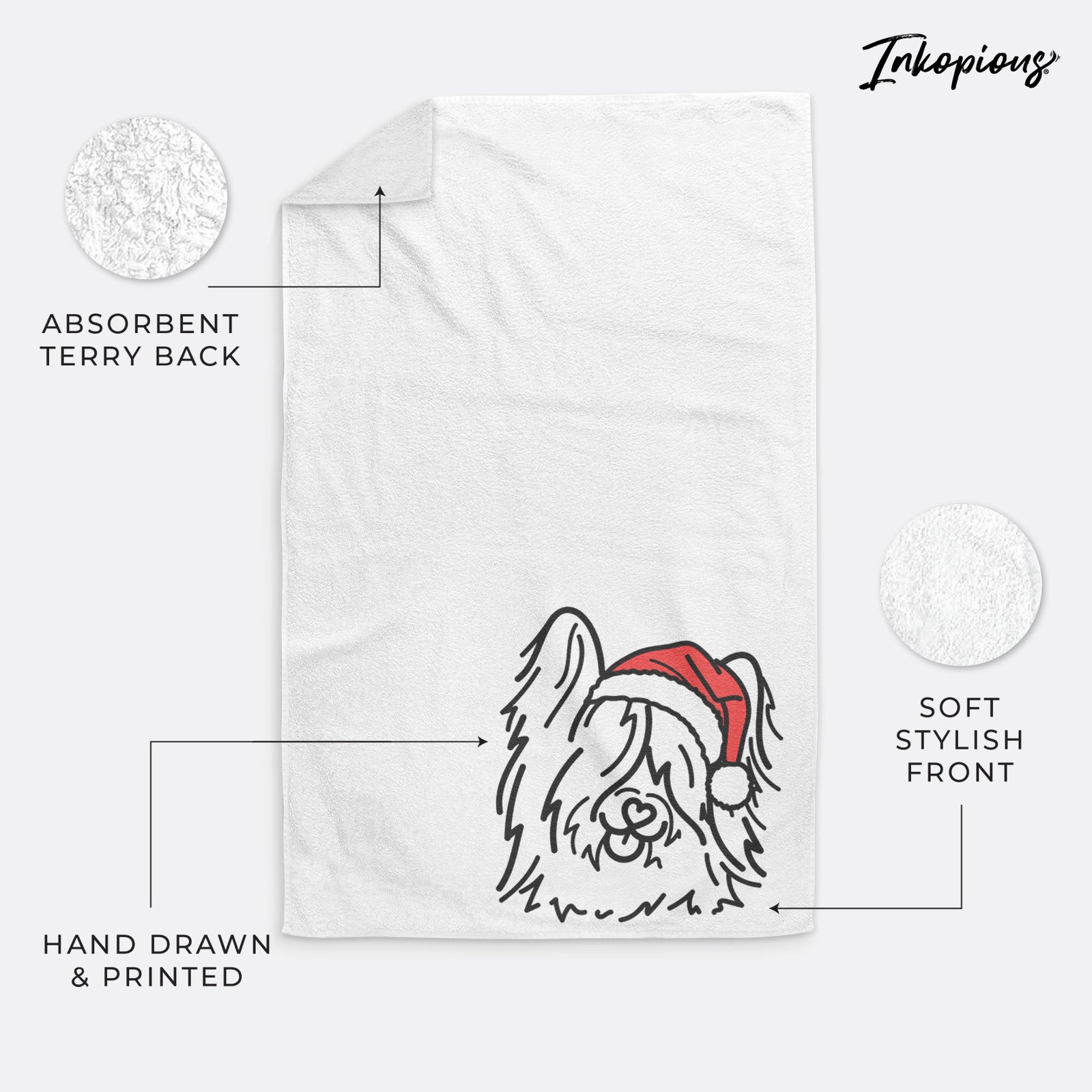 Minimalist line drawing of Dougal the Skye Terrier wearing a Santa hat on a hand towel