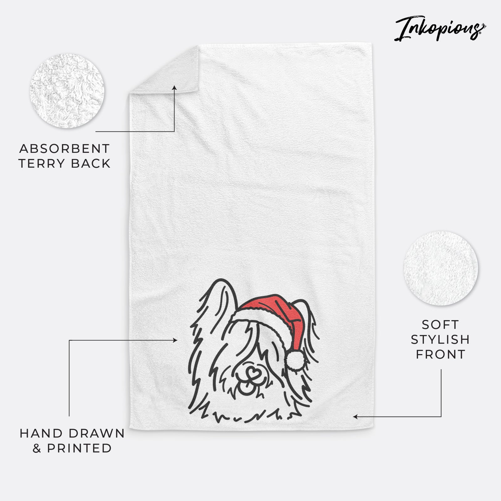 Minimalist line drawing of Dougal the Skye Terrier wearing a Santa hat on a hand towel