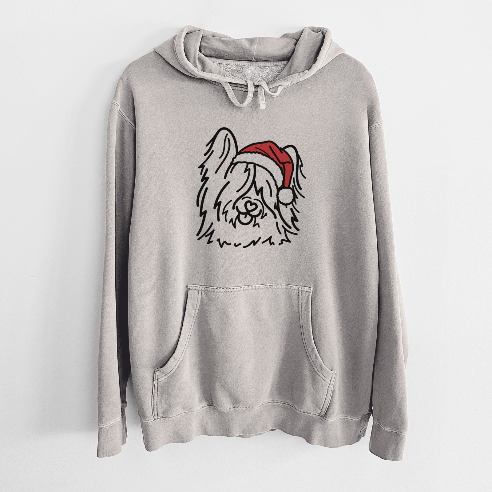 Minimalist line drawing of Dougal the Skye Terrier wearing a Santa hat on a Cement Unisex pigment dyed hoodie