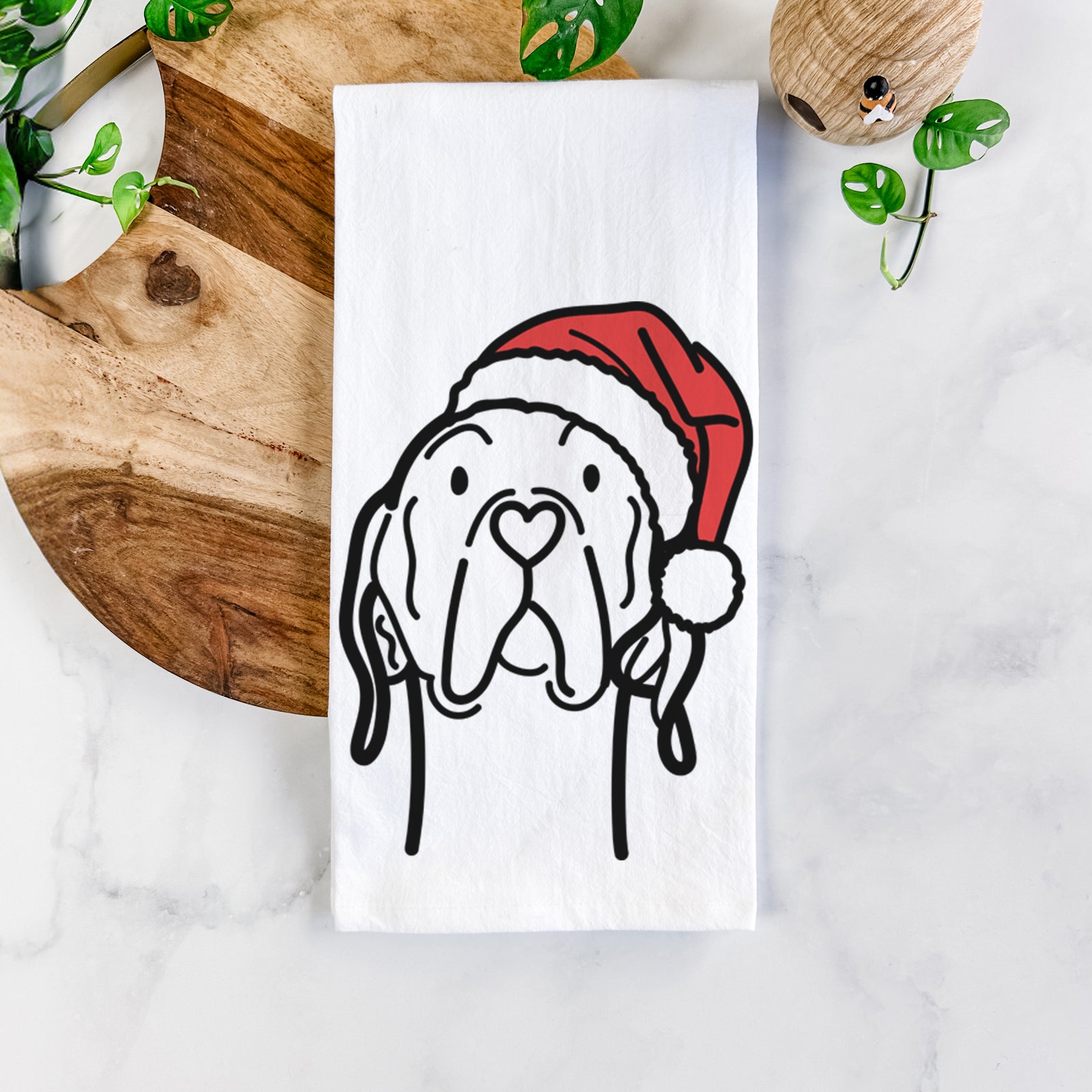 Minimalist line drawing of an English Pointer wearing a Santa hat on a tea towel