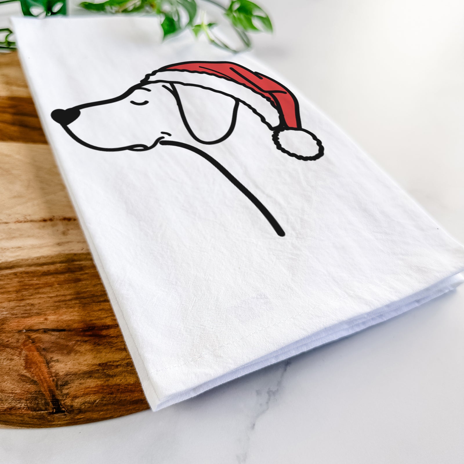 Minimalist line drawing of a German Shorthaired Pointer wearing a Santa hat on a tea towel