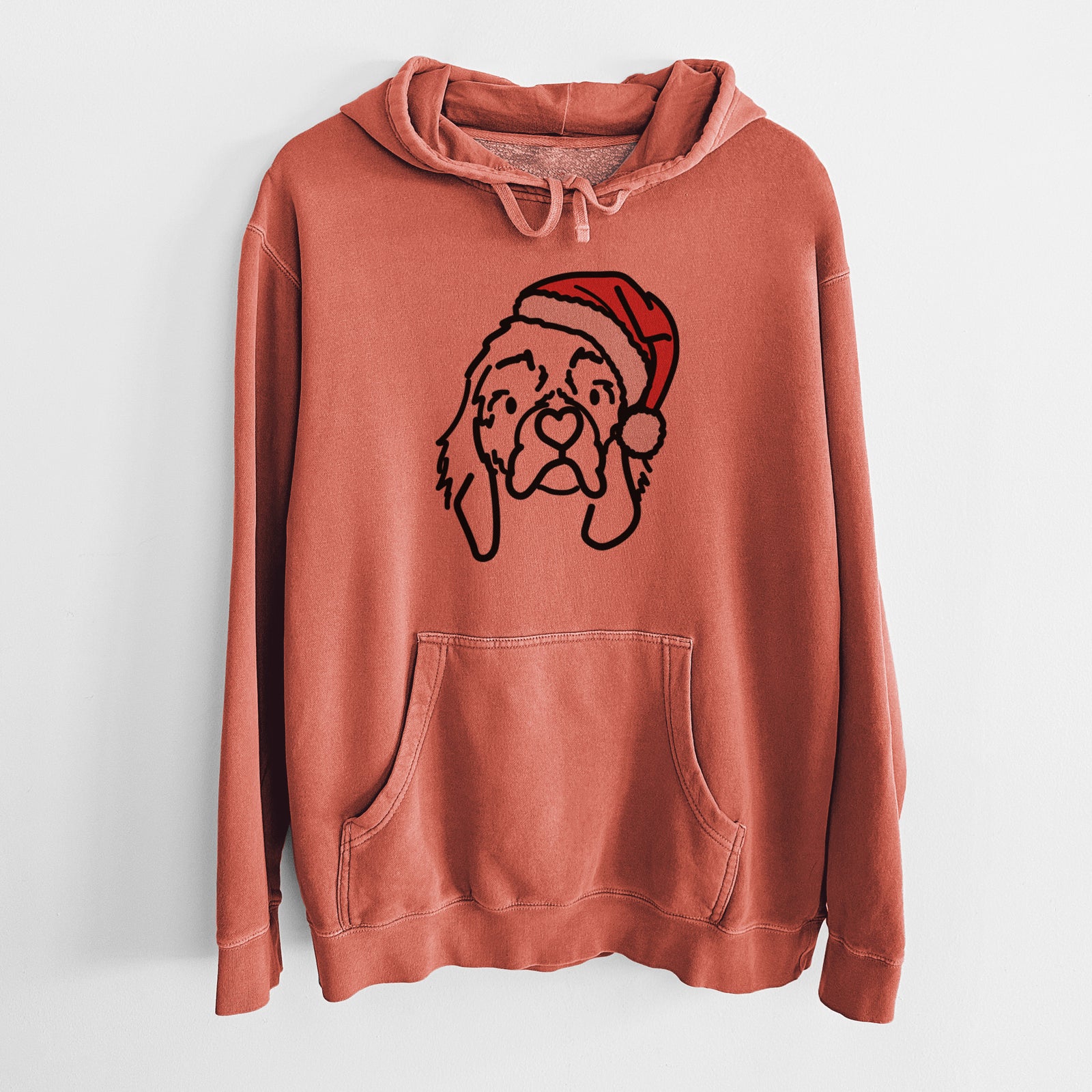 Minimalist line drawing of GiGi the Cocker Spaniel wearing a Santa hat on an Amber Unisex pigment dyed hoodie