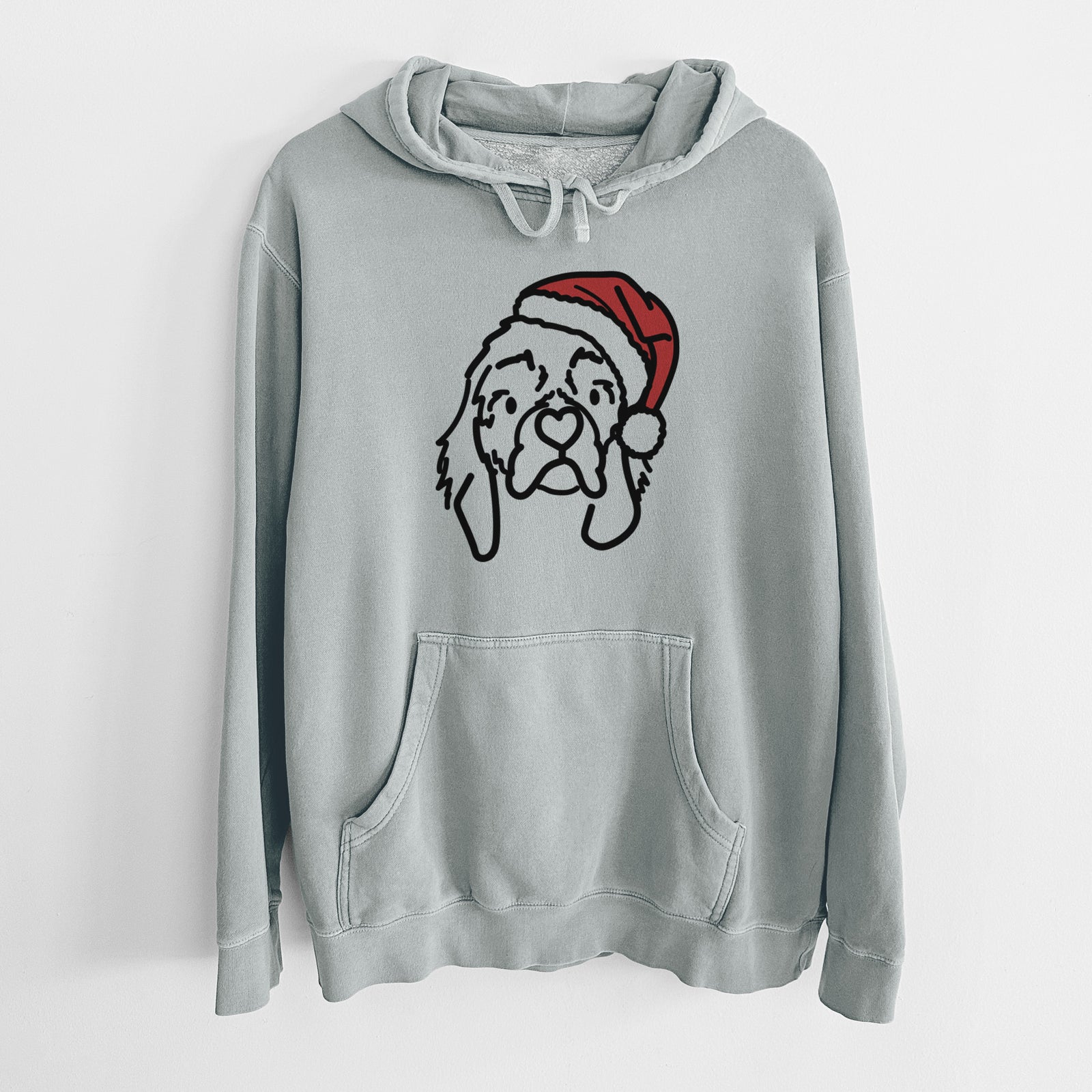 Minimalist line drawing of GiGi the Cocker Spaniel wearing a Santa hat on a Sage Unisex pigment dyed hoodie