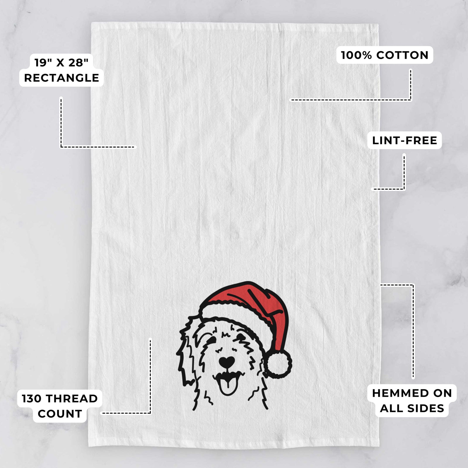 Minimalist line drawing of a Goldendoodle wearing a Santa hat on a tea towel, with feature callouts: 19 x 28 inch rectangle, 100% cotton, lint-free, 120 thread count, hemmed on all sides