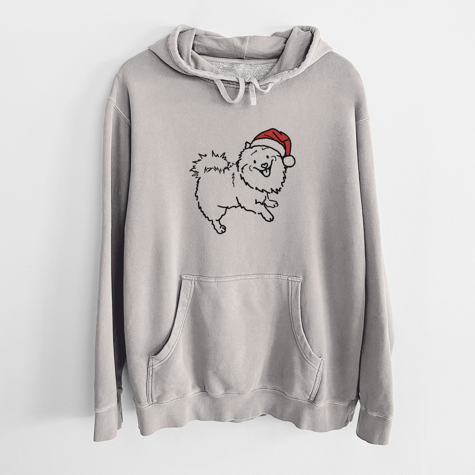 Minimalist line drawing of Goldie the Pomeranian Mix wearing a Santa hat on a Cement Unisex pigment dyed hoodie