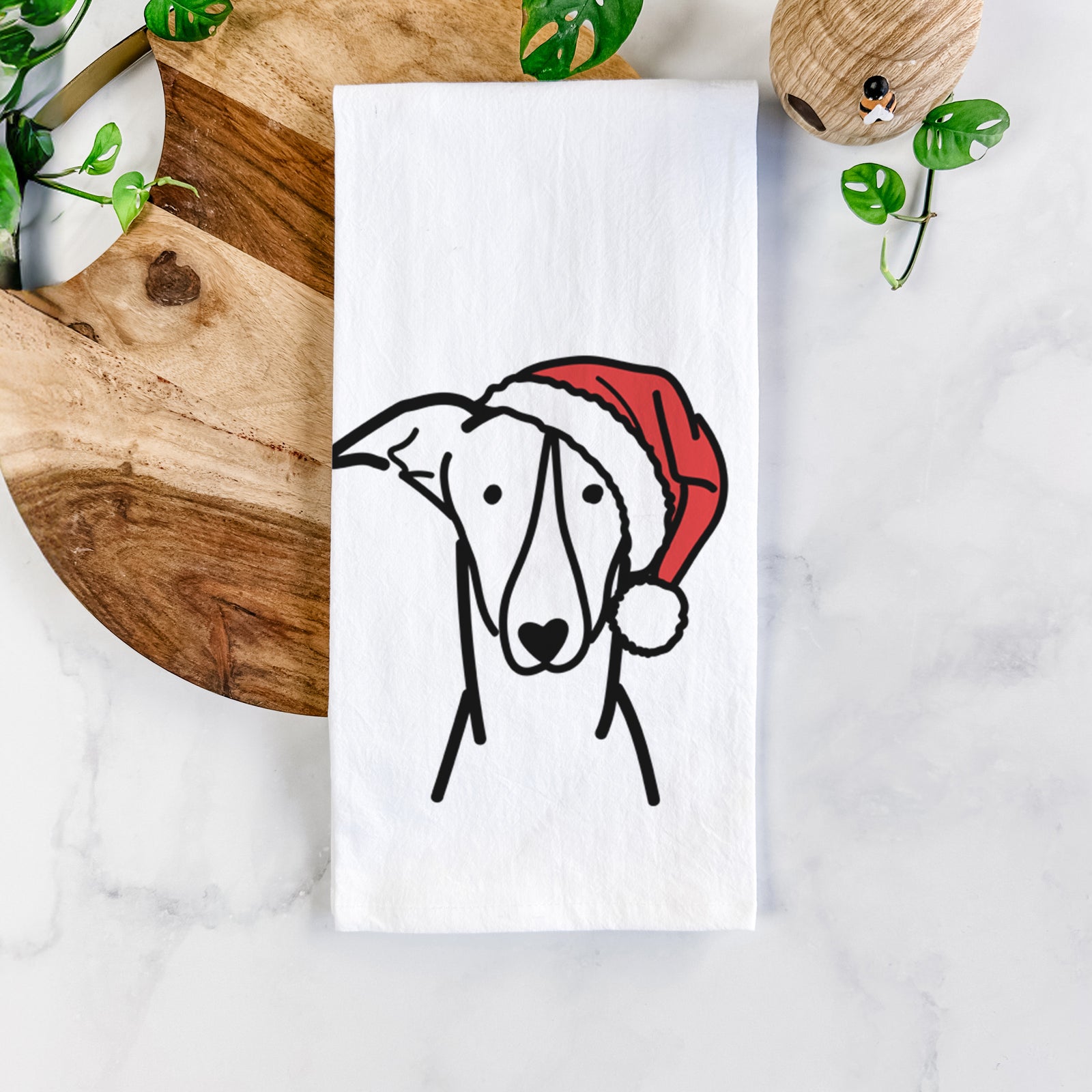 Minimalist line drawing of a Greyhound wearing a Santa hat on a tea towel