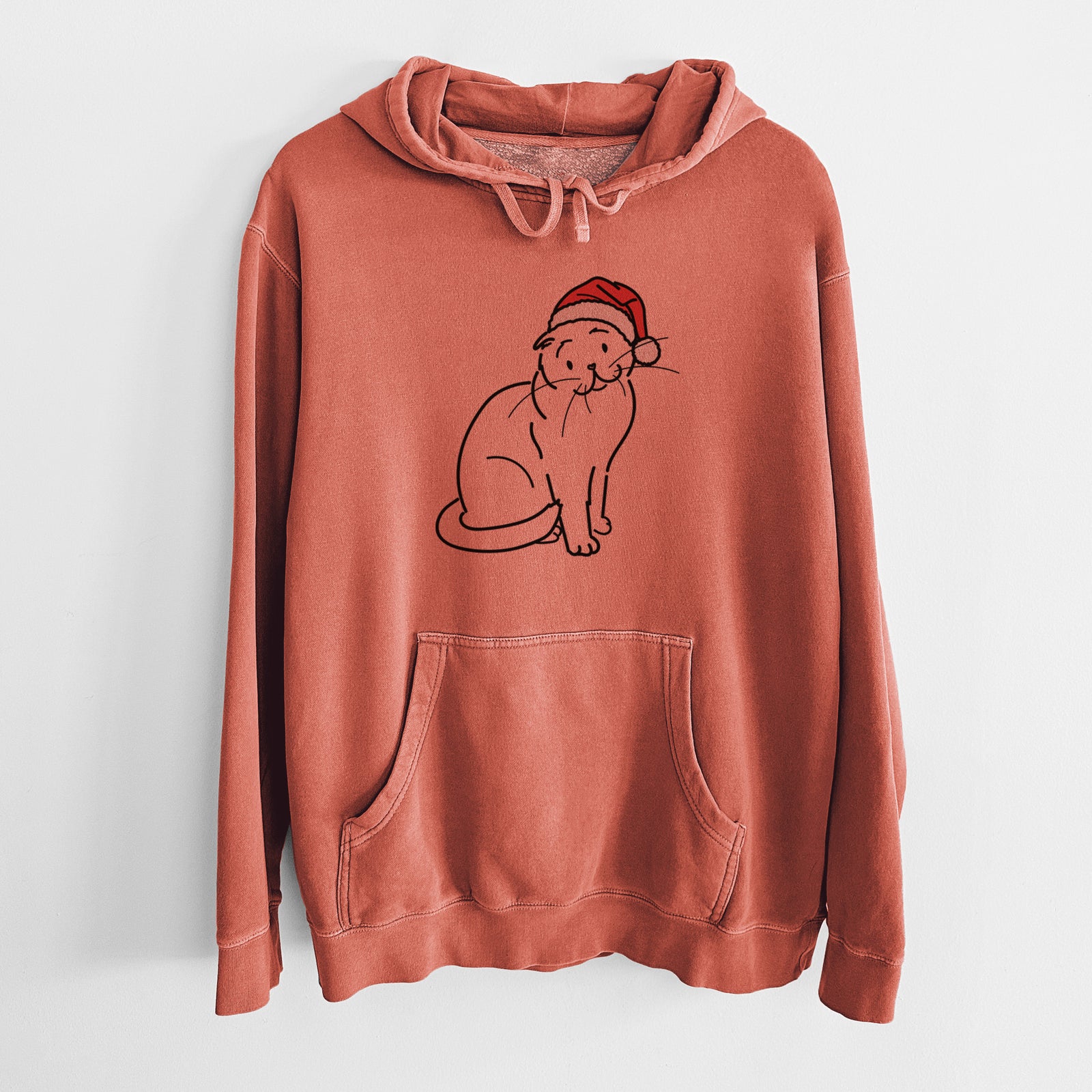 Minimalist line drawing of Hank the Scottish Fold Cat wearing a Santa hat on an Amber Unisex pigment dyed hoodie
