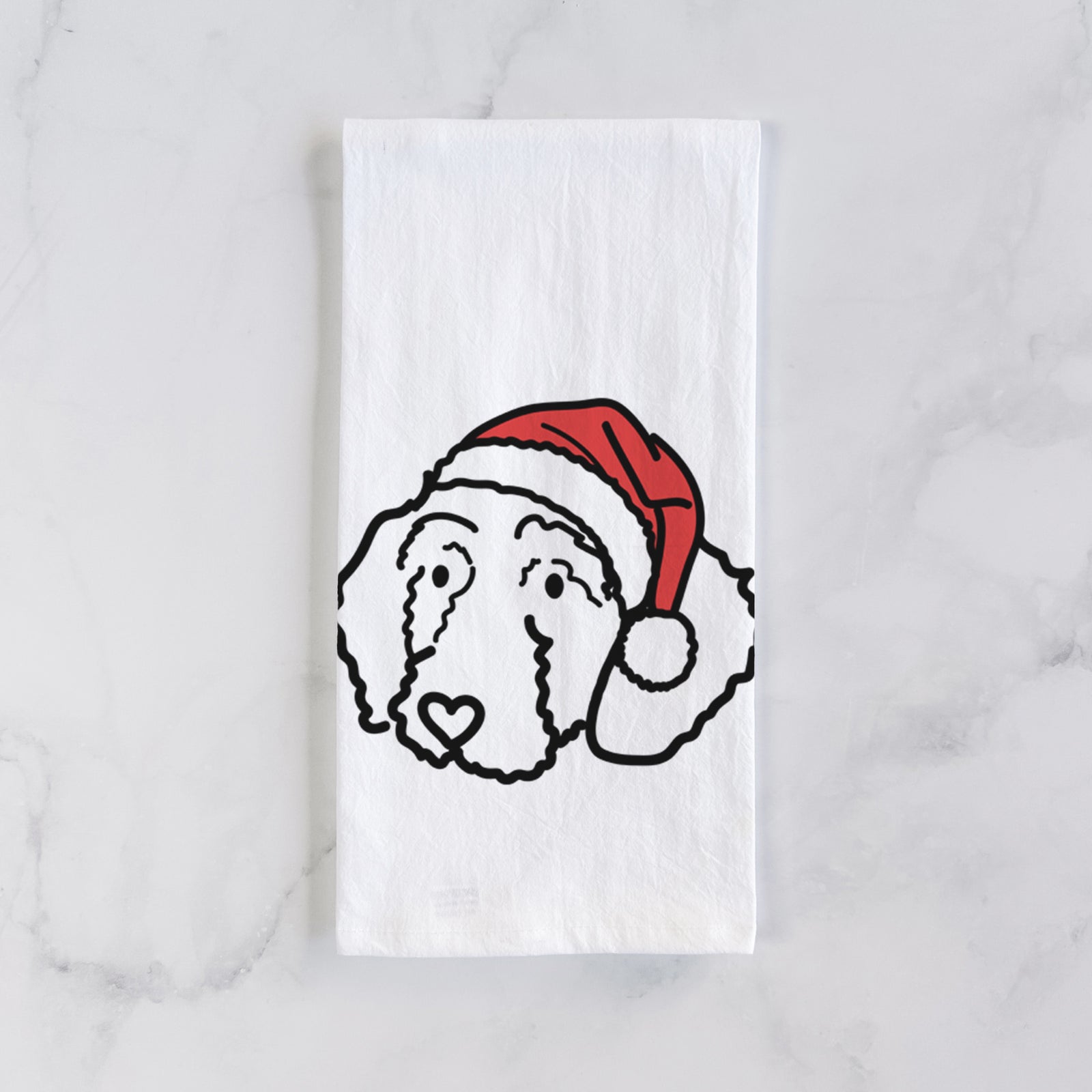 Minimalist line drawing of Hanna the Goldendoodle wearing a Santa hat on a tea towel