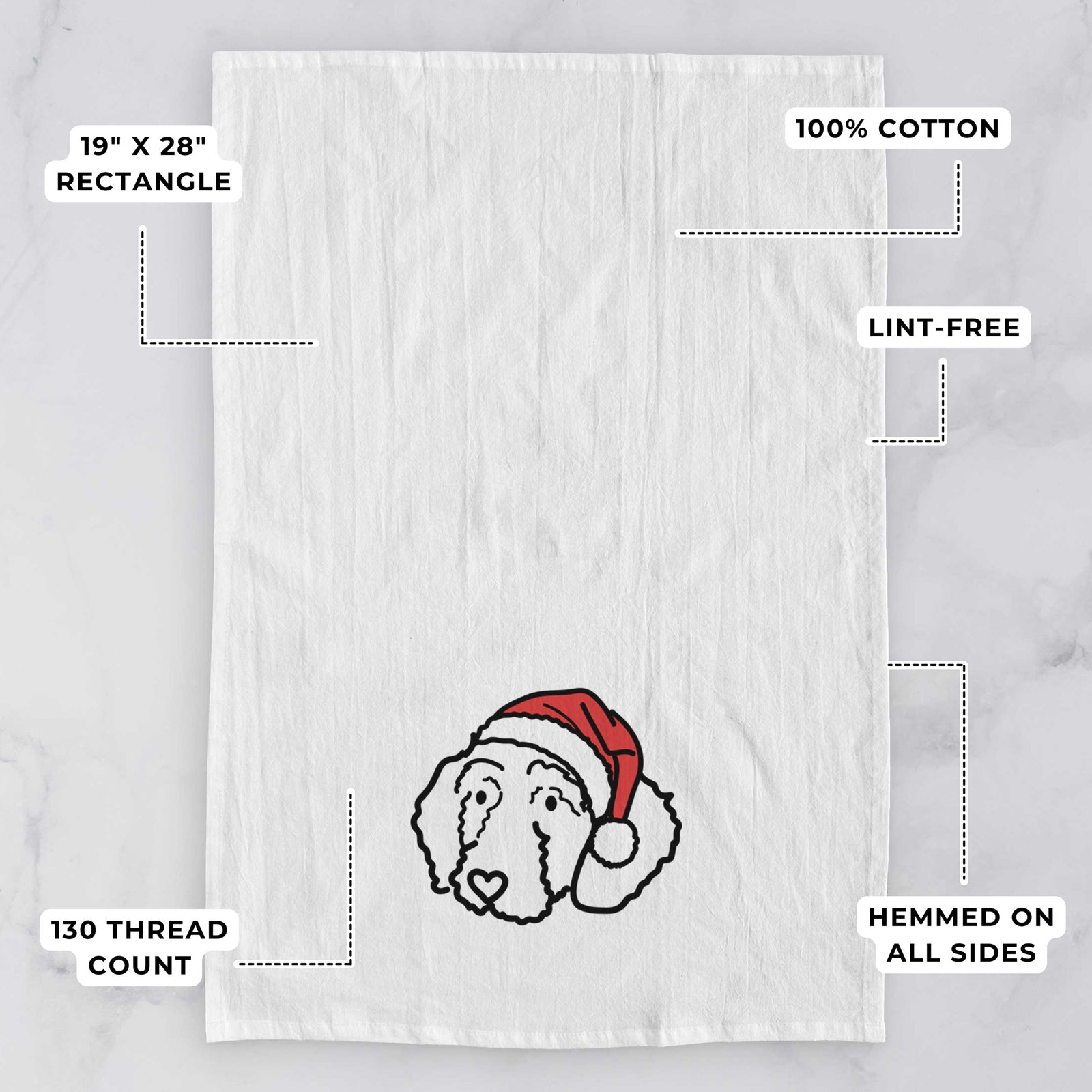 Minimalist line drawing of Hanna the Goldendoodle wearing a Santa hat on a tea towel, with feature callouts: 19 x 28 inch rectangle, 100% cotton, lint-free, 120 thread count, hemmed on all sides